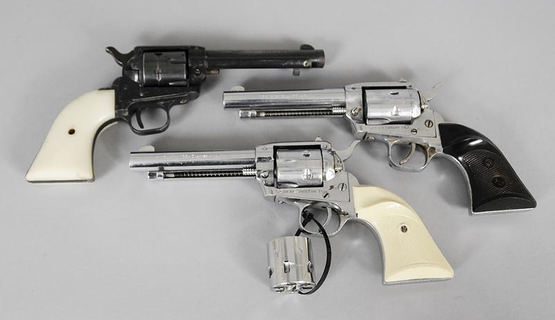 Three Single Action .22 Revolvers: FIE Model E15, .22 LR, 6- shot, 4 in. barrel, nickel plated, hammer safety, S/N IA62889, good condition; TANFOGLIO Model E15, .22 LR/.22 Magnum, 6-shot, 4.5 in. barrel, bright nickel, hammer safety, t