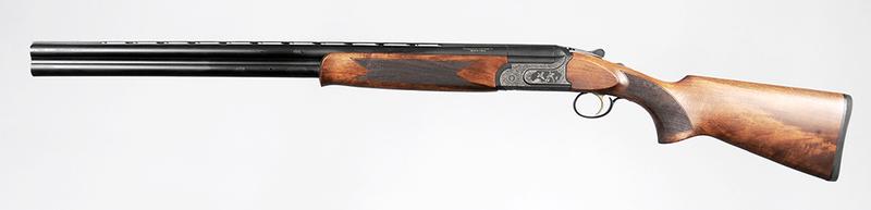 TR Imports Silver Eagle Over/Under Shotgun: 12 ga., 3 in. or shorter, 28 in. vent rib barrels, S/N 17381016, heavily engraved receiver, checkered wood stock