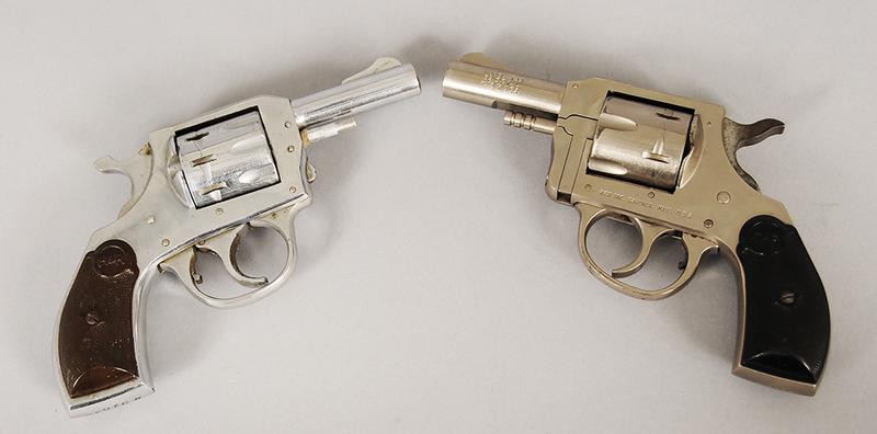 Two H&R Revolvers: Model 733, .32 S&W, 2.5 in. barrel, 6-shot, S/N AT104443, stainless, fair condition, double action not fully functional/timing issue ; Model 923, .22 LR, 2.5 in. barrel, 9-shot, S/N M51046, bright nic