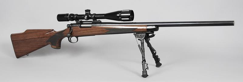 Remington Model 700 Bolt Action Rifle: .243 WIN, S/N 6823286, 24 in. barrel, checkered walnut stock, bipod, Bushnell 5-20x40 Sport View Quad-Power scope with 5-20x magnification, 40mm Objective lens, 40-1000 yard AO focus, BDC turret on to