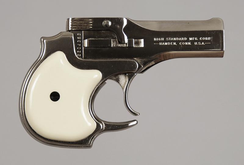 High Standard Model D-101 Derringer: .22 cal., S/N 2204353, 3-1/2 in. barrel, over/under, top break, off-white plastic grips, integral front blade sight, in fitted box