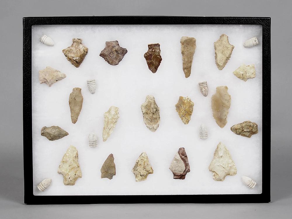 Chattahoochee Arrowheads and Confederate Bullets: nineteen arrowheads (said to be found along the Chattahoochee River in Alabama/Georgia), range in size from 1-1/2 in. to 3 in., eight Confederate 3 ring Mini Ball bullets, 11 in. x 15 in. presentation