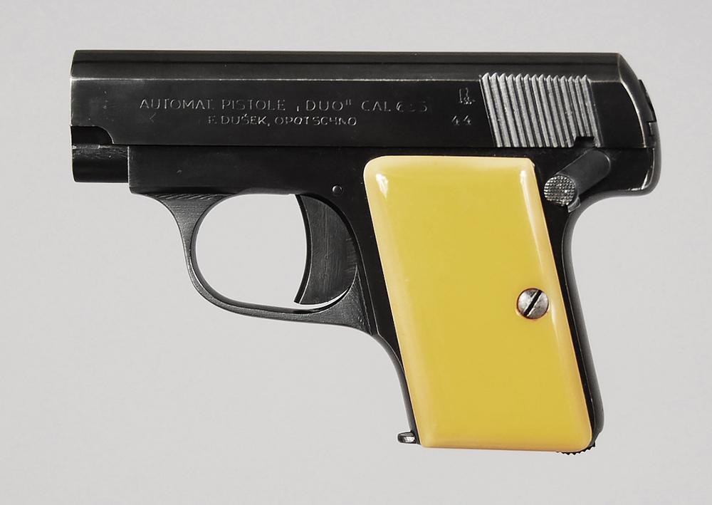 F. Dusek/ CZ DUO Pocket Pistol: 6.35mm (.25 ACP), S/N 104643, 2 in. barrel, one magazine, replaced plastic grips, left side of slide marked "AUTOMAT PISTOLE DUO" CAL 635/F.DUSEK, OPOTSCHNO", "44", soft leather belt holster