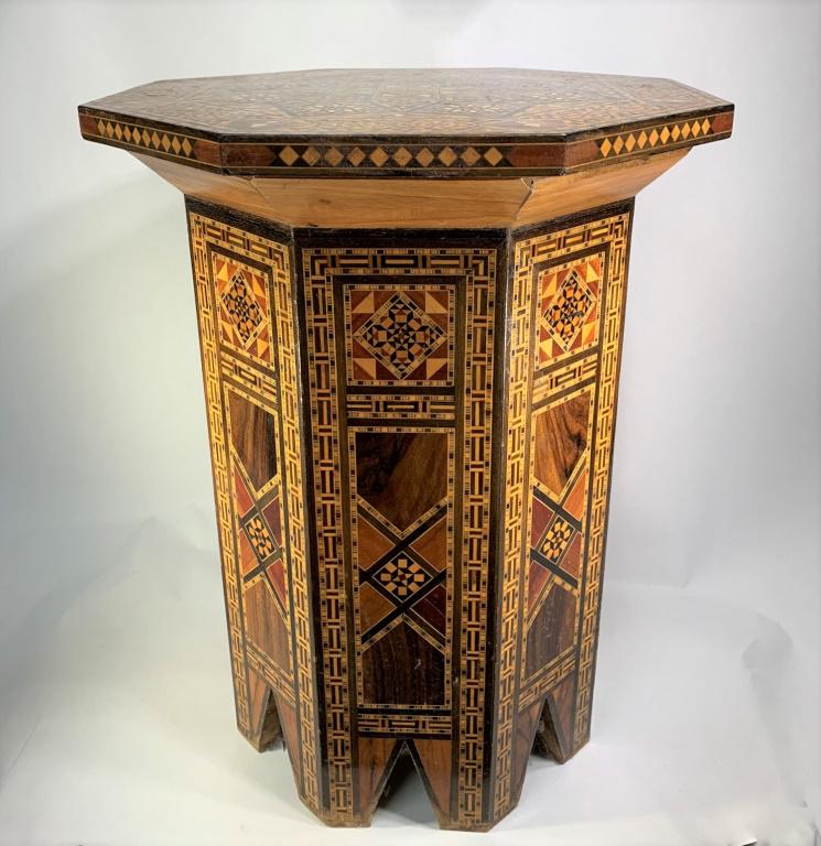 Vintage Moroccan Side Table: Vintage Moroccan Inlaid Side Table With Hinged Lid. Marquetry of various woods and mother of pearl with lined interior. Unsigned. Good condition. Measures 19-1/2" H x 15" W. This item is too large to 