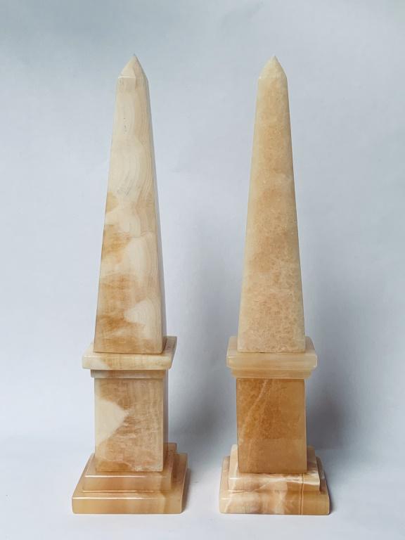 Pair of Large Stone Obelisks: Handsome pair of large stone obelisks. Unsigned. Tiny ding on point of one or in very good condition. Measures 18" H x 4-1/4" W. Domestic shipping $65.00 plus 2% insurance.