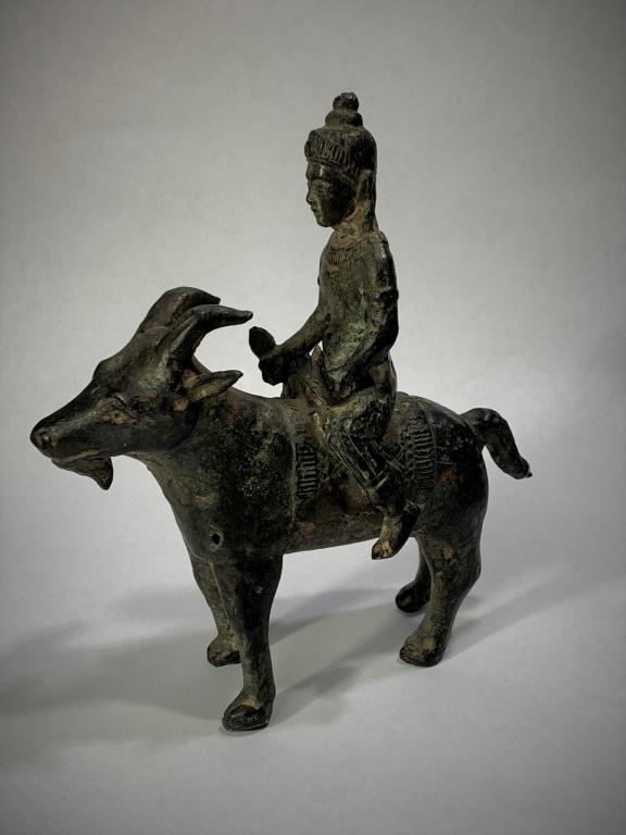 Early Indian Mughal Bronze Man On Bull: Early Indian Mughal Bronze Man On Bull. Unsigned. Good condition. Measures 6" H x 5-1/4" L.
