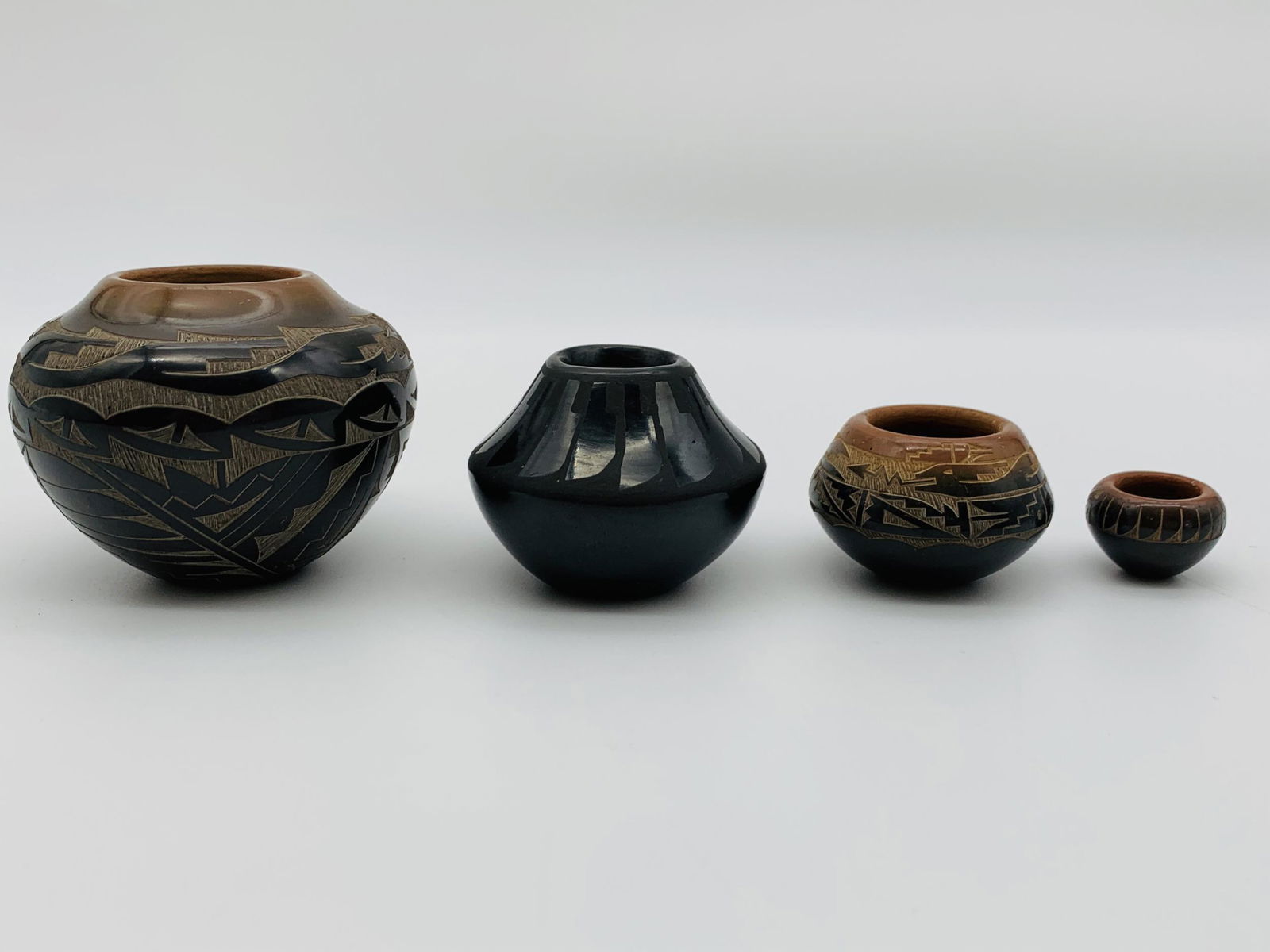 Four Santa Clara Pueblo Miniature Pottery Vases (1 of 8)