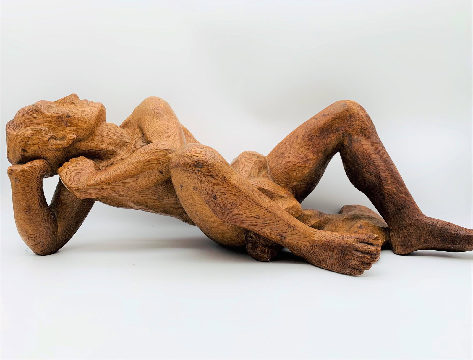 Anton Grauel German (1871-1971) Carved Wood Sculpture: Anton Grauel German (1871-1971) Carved Wood Sculpture "Recumbent Male Nude". About the artist: In 1931, he established himself in Berlin, as one of the nation's outstanding artists in his field. Anton