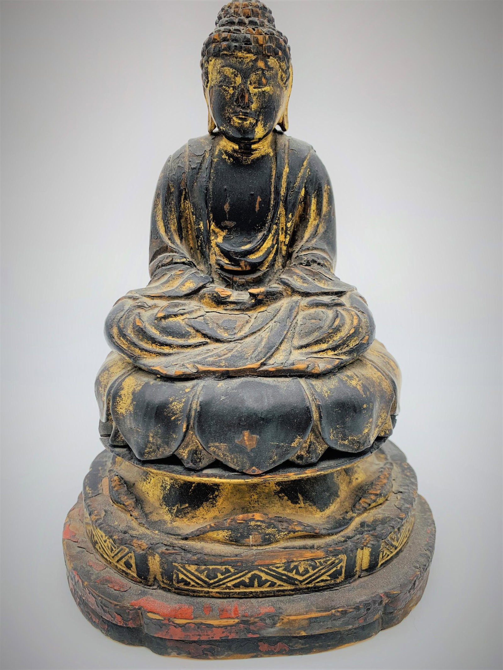 18th C Japanese Carved Gilt Wood Buddha: 18th Century Japanese Carved Gilt Wood Buddha Figure. Signed in ink on bottom. Typical wear and age cracks consistent with age, Measures 8" H x 5-1/2" W.