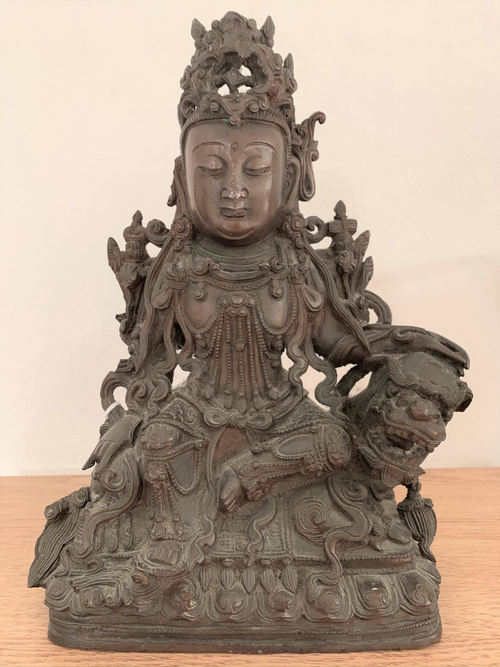 18 C or Earlier Chinese Bronze Guanyin With Dragon: 18 C or Earlier Chinese Bronze Guanyin With Dragon. Finely detailed. Unsigned. Some noticeable areas of wear and losses. Measures 11" H x 8-1/2" W.