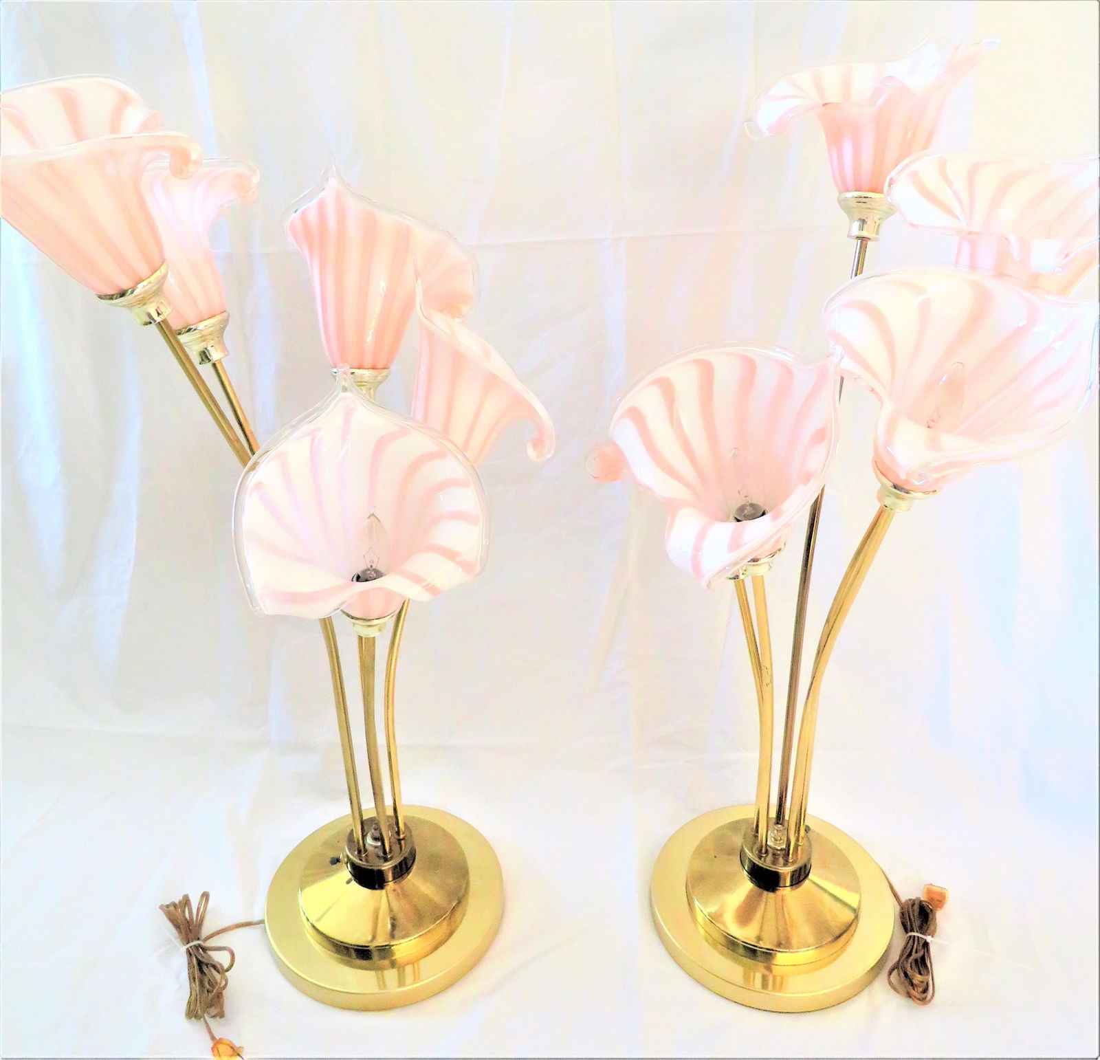 Pr Franco Luce Murano Art Glass Lily Lamps: Pair Franco Luce Murano Art Glass Lily Lamps. Each with brass bases and 5 arms with glass shades. Unsigned. Typical wear to finish or in good condition. Measures 34" H x 20" W. Third party shipping.