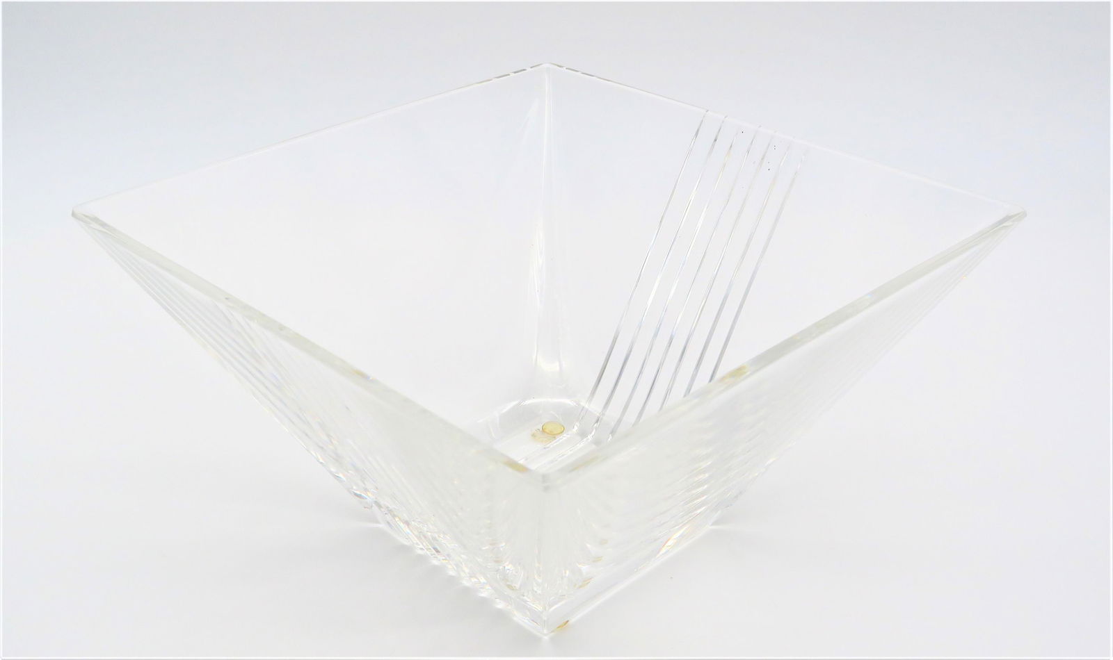 Kosta Boda Goran Warff Vase 48229: Kosta Boda Goran Warff Square Twisted Art Glass Vase #48229. Signed. Tiny fleabite on one top corner. Measures 8" H x 5-1/2" W. Third party shipping.