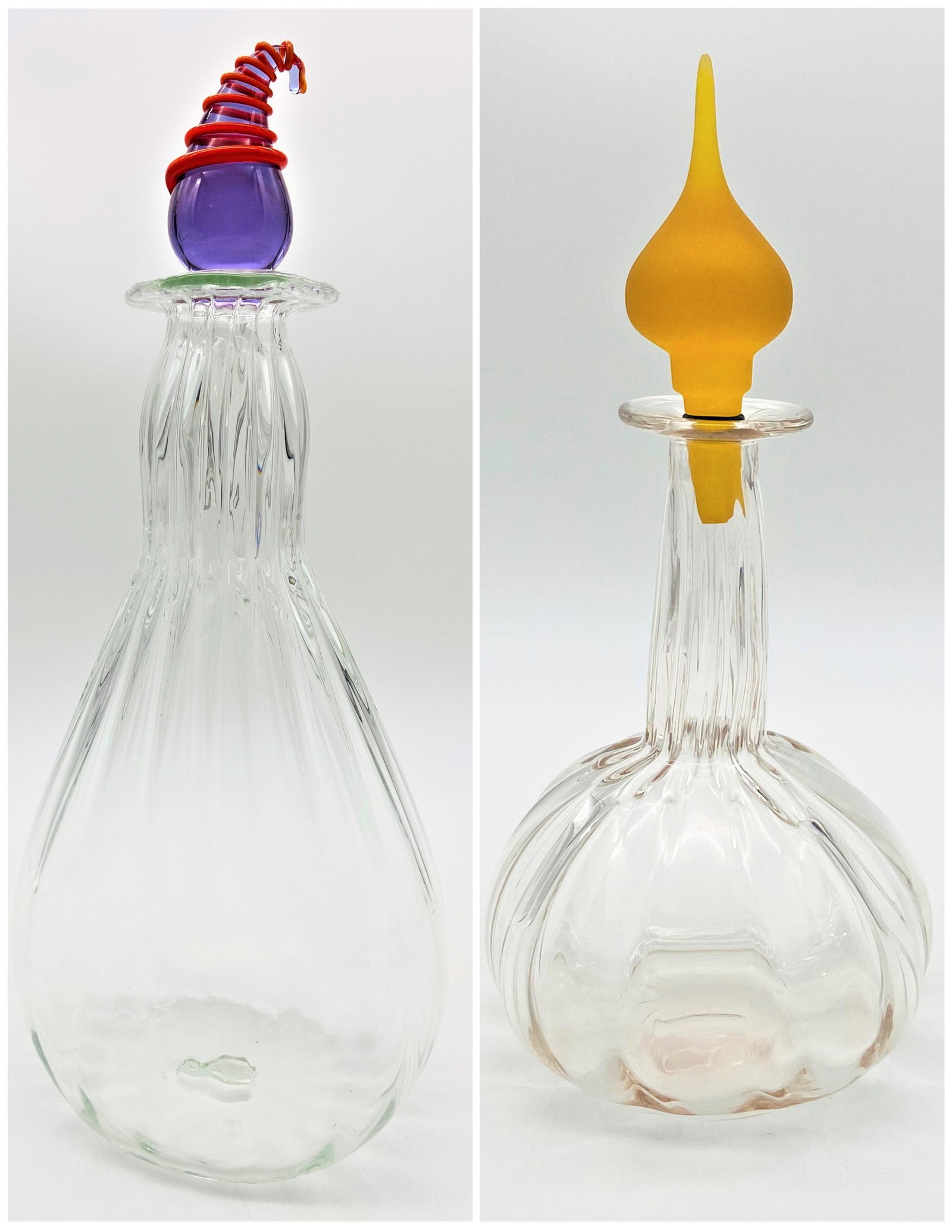 2 ICET Arte Murano Glass Decanters: 2 ICET Arte Murano Glass Decanters. Bother with colored decorative stoppers. Stamped mark on bottom. The taller has small loss to stoper swirl or in good condition. Measures 15" H x 6-1/2" W, the smal