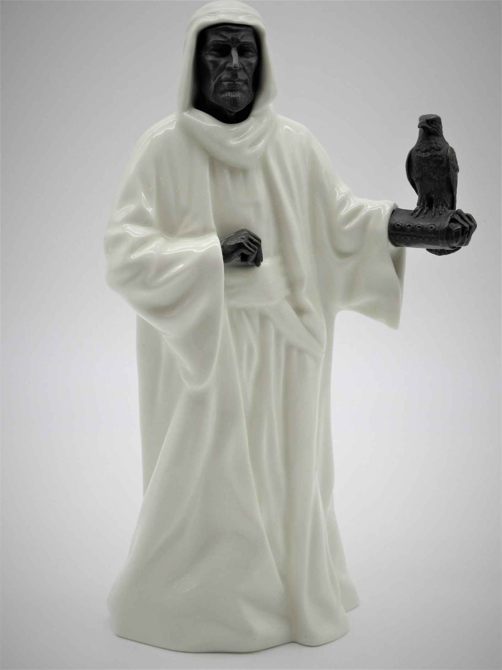 Minton Bone China Figurine "The Sheik": Minton Bone China and Bronze Figurine "The Sheik". Backstamp. Dated 1978. Light hairline to back of head or in good condition. Measures 10-1/4" x 5-1/2". Third party shipping.