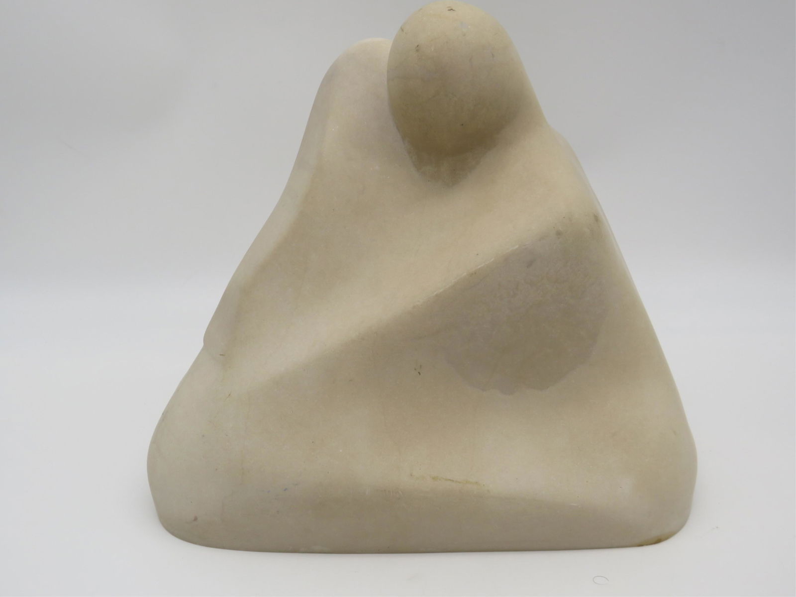 Jean Arp Style Carved Marble Figural Sculpture: Jean Arp Style Carved Marble Figural Sculpture. Unsigned. Minor chips on bottom edge or in good condition. Measures 8" H x 9" W x 5" D. Weighs approx 12-1/2 lbs. Third party shipping