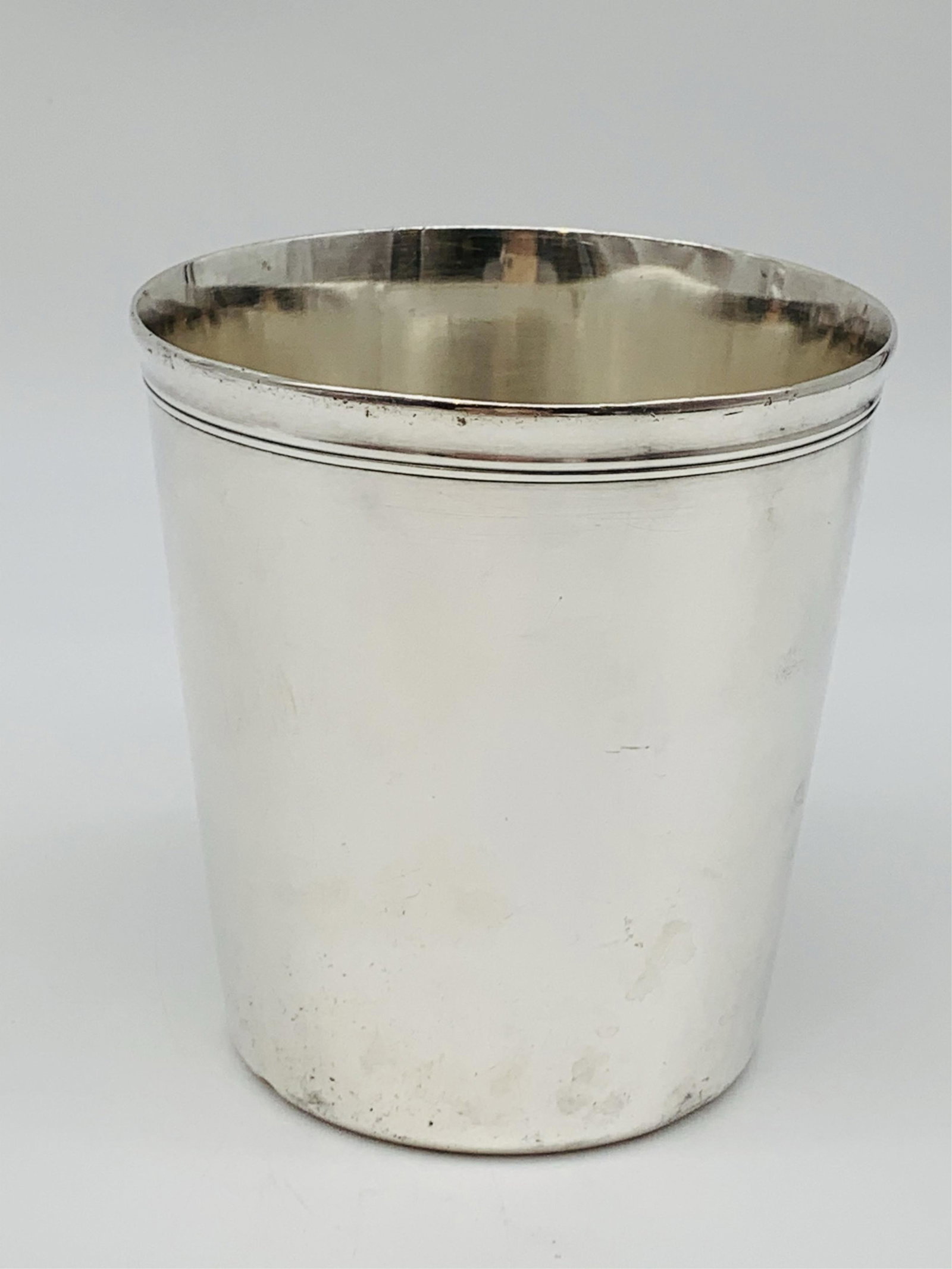 Christofle Silver Plate Beaker: Christofle Silver Plate Beaker. Signed. Dings, scratches. Measures 4" H. Third party shipping.