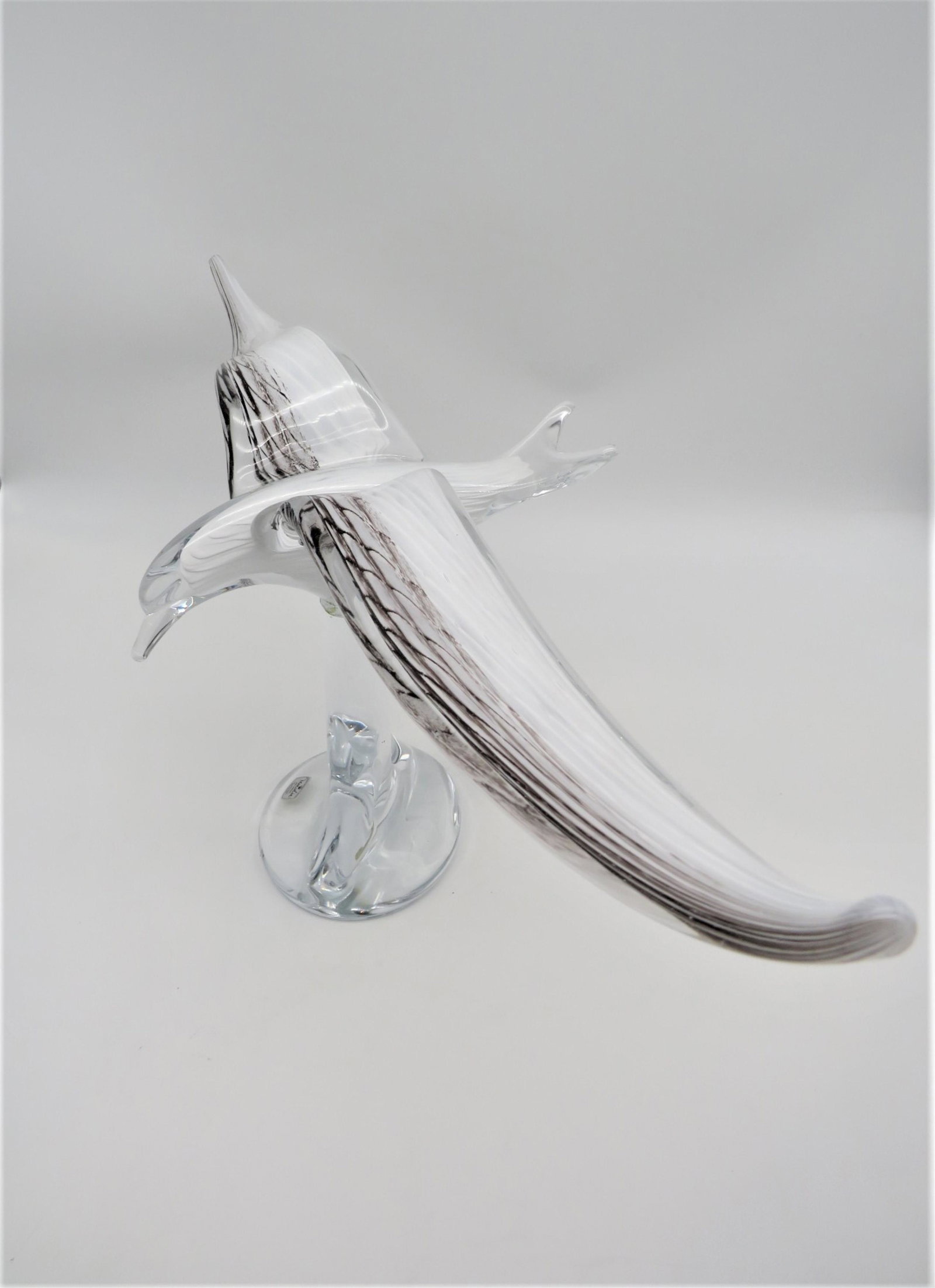 Marcolin / F.M. Konstglas Bird Sculpture: Large Mid Century Marcolin / F.M. Konstglas Art Glass Bird Sculpture. Signed, numbered, and dated. Original label still attached to the surface. Presentation marked Jonathan. Good condition. Measures 