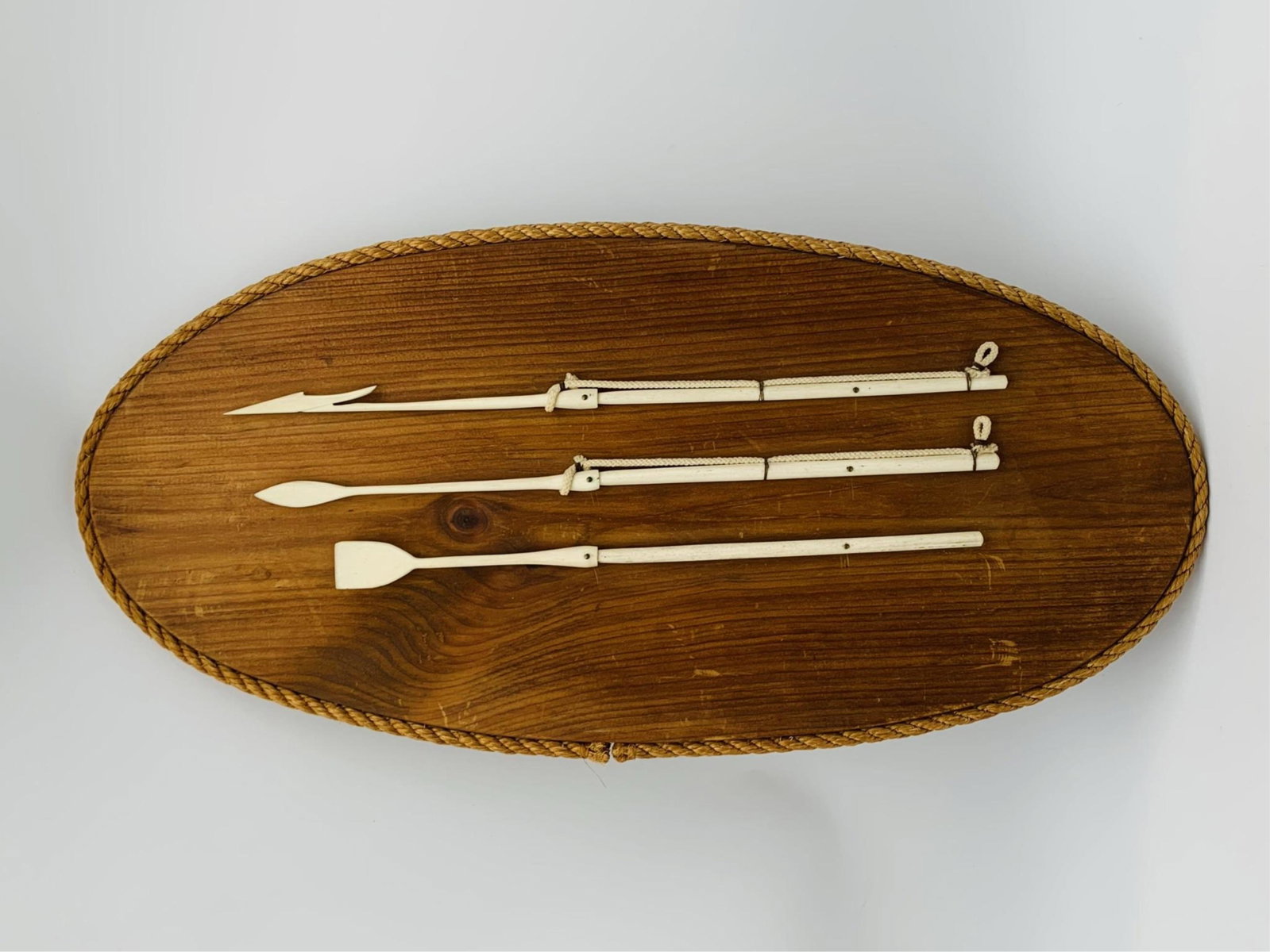 Vintage Bone Miniature Whaling Harpoons: Vintage Bone Carved Wall Hanging Nautical Whaling Harpoons Decor. Unmarked. Good condition. Wood backing measures 10-1/2" x 21-7/8". Third party shipping.