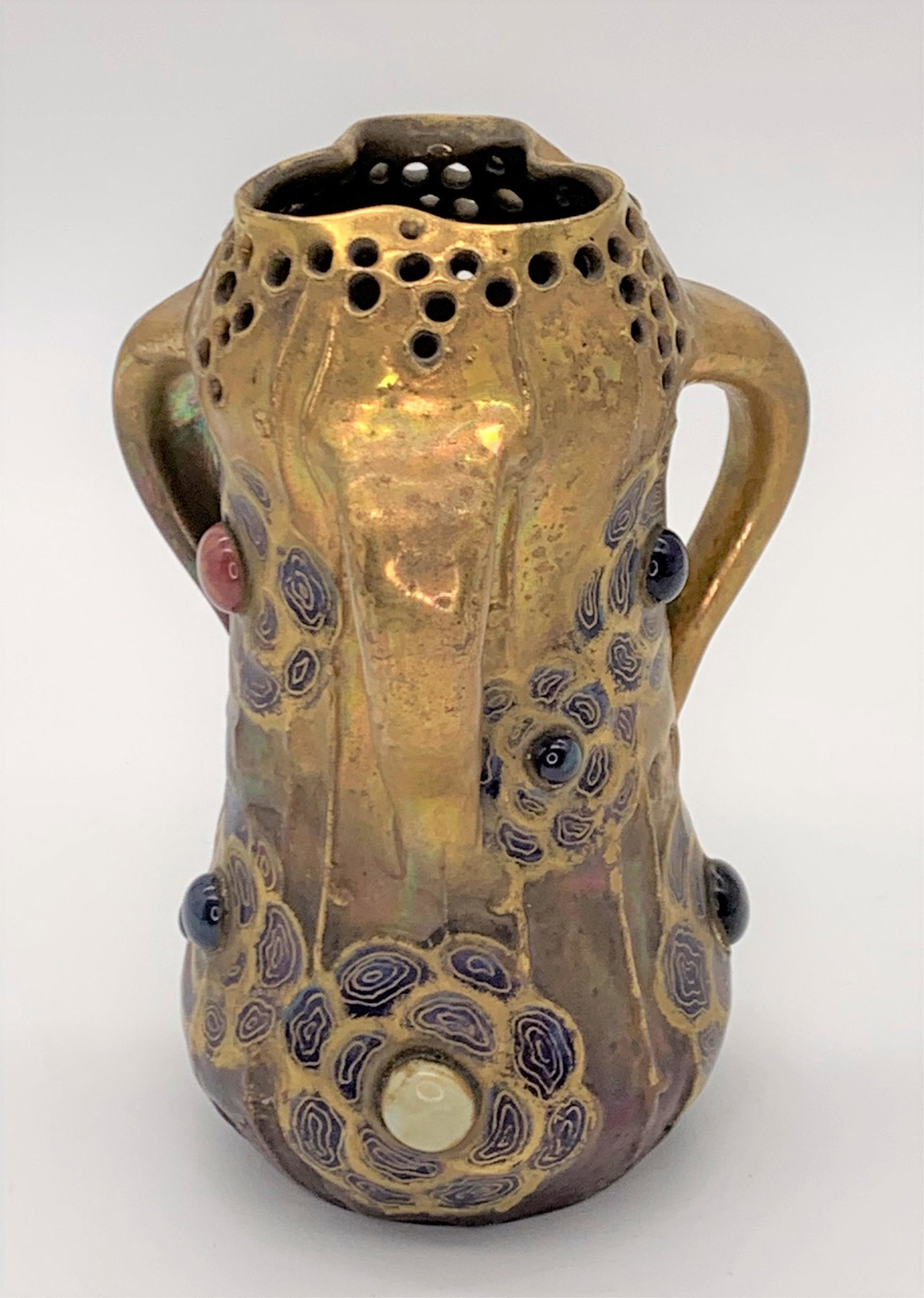 Art Nouveau Amphora Gres-Bijou Vase: Art Nouveau Amphora/ Riessner & Kessel Gres-Bijou Ceramic Tri-handled Vase. Biomorphic form with rich glossy and matte gilt and subtle color finishes, abstract bas-relief motifs and simulated jewels. 