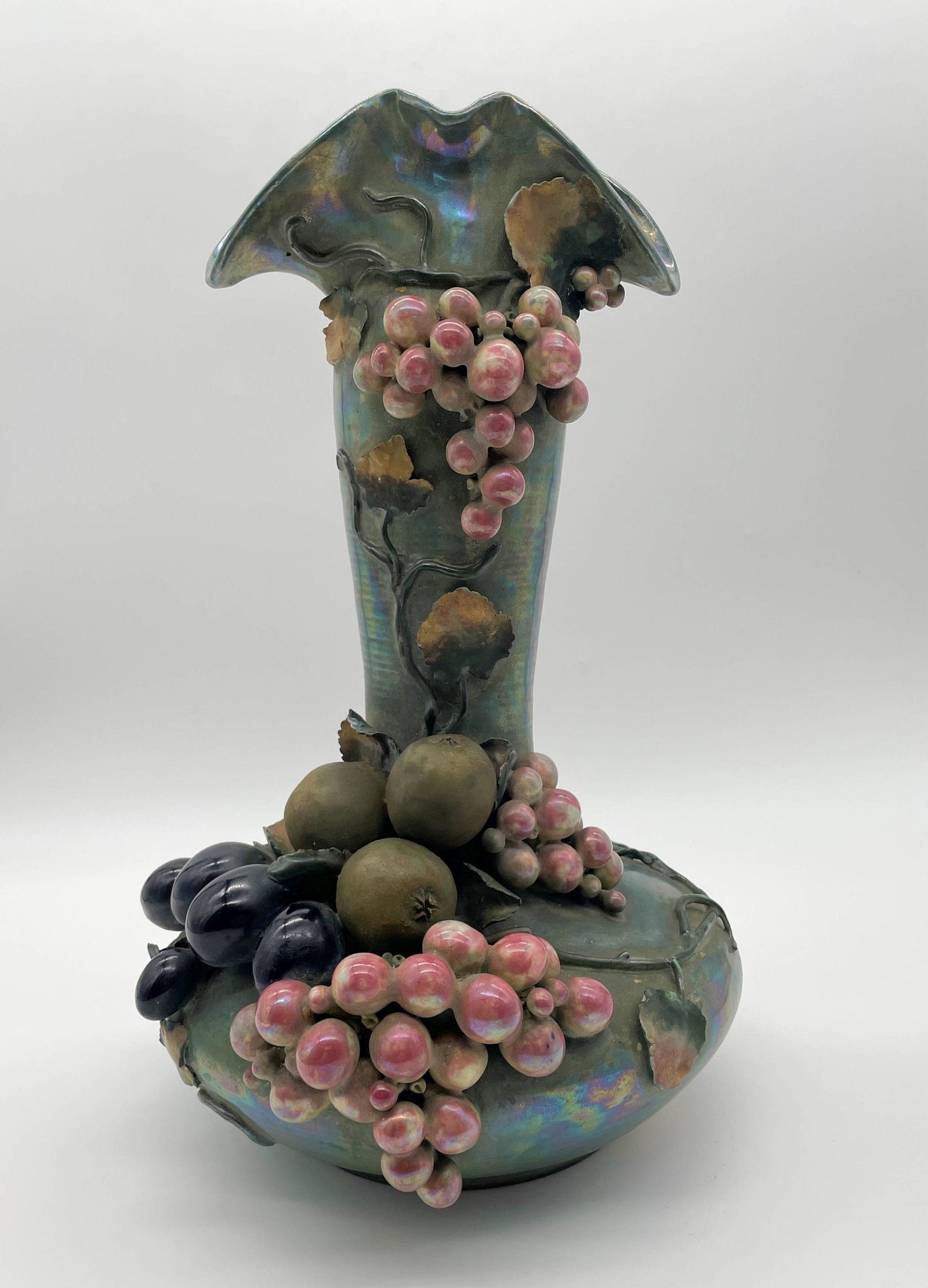 Large Amphora Art Nouveau Fruit & Berry Vase: Large Amphora Art Nouveau Fruit & Berry Vase. c. 1902, Austria polychrome iridescent lustre glazed pottery, sculpted with applied grape vines and molded fruit clusters, stamped "Amphora 3740/58". One 