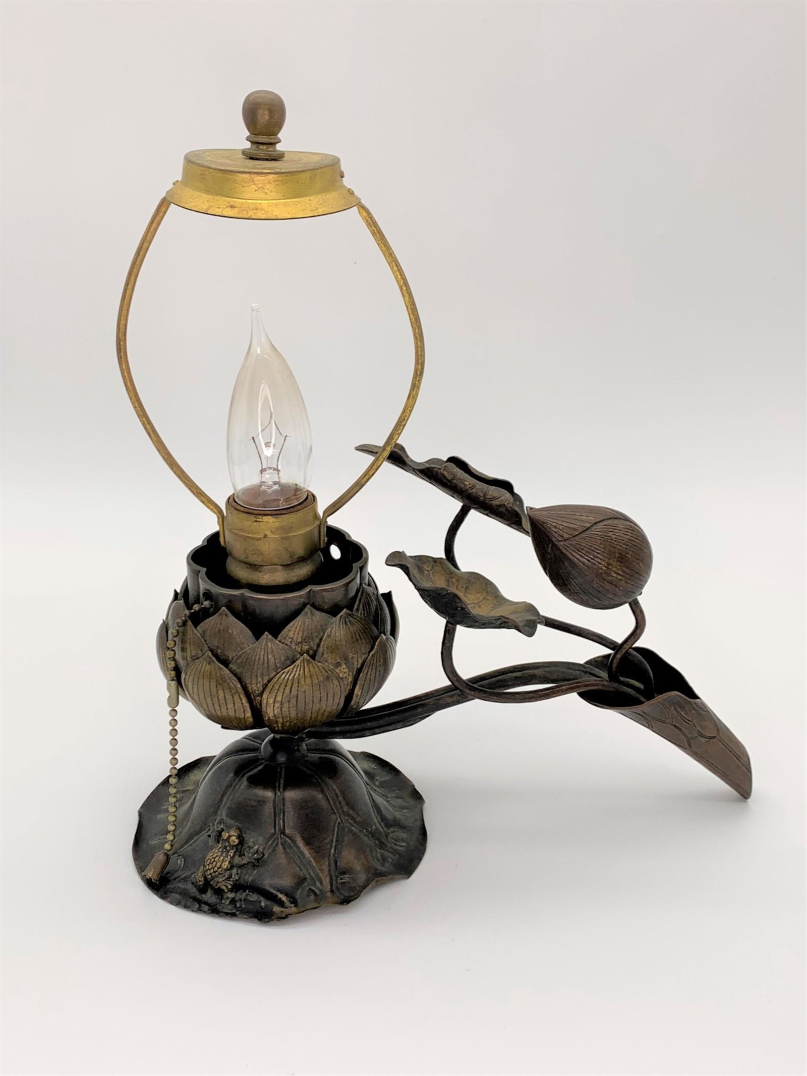 Japanese Meiji Gilt Bronze Lotus Form Lamp: Unusual Japanese Meiji Gilt Bronze Lotus Form Lamp. Notice the tiny frog on the foot and hinged pod which opens. We are not sure if this was originally intended to be an electric lamp, however it was 