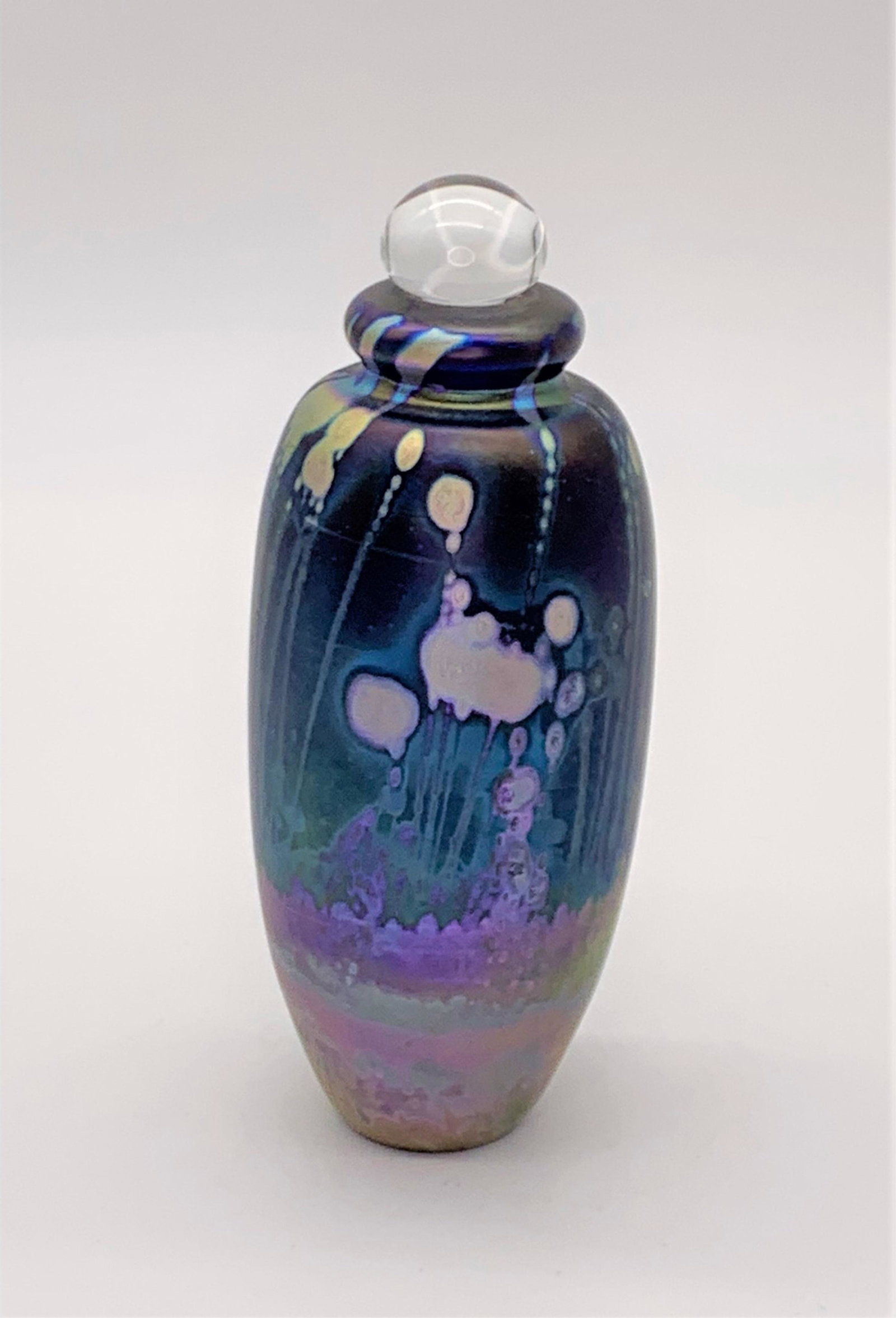 Robert Eickholt Oil Spot Art Glass Perfume Bottle: Robert Eickholt (20th C) Oil Spot Art Glass Perfume Bottle. Signed and dated 1985. Good condition. Measures 6-1/4" H x 2-1/2" W. Third party shipping or free local pick-up within 60 days of end of sal