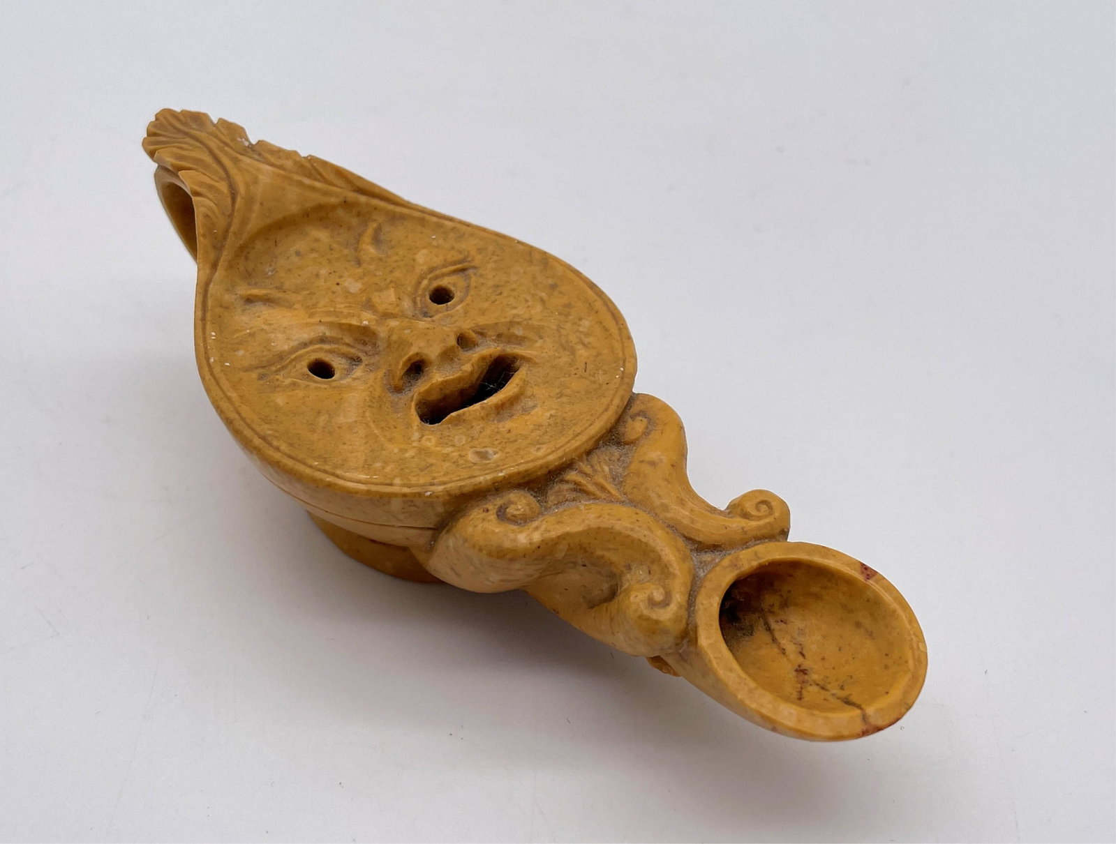 Carved Soapstone Figural Miniature Oil Lamp: Carved Soapstone Figural Miniature Oil Lamp. Unmarked. Good condition. Measures 1-1/2" H x 4-3/4" L. All Items Are Third party shipping or free local pick-up within 60 days of end of sale. Please revi