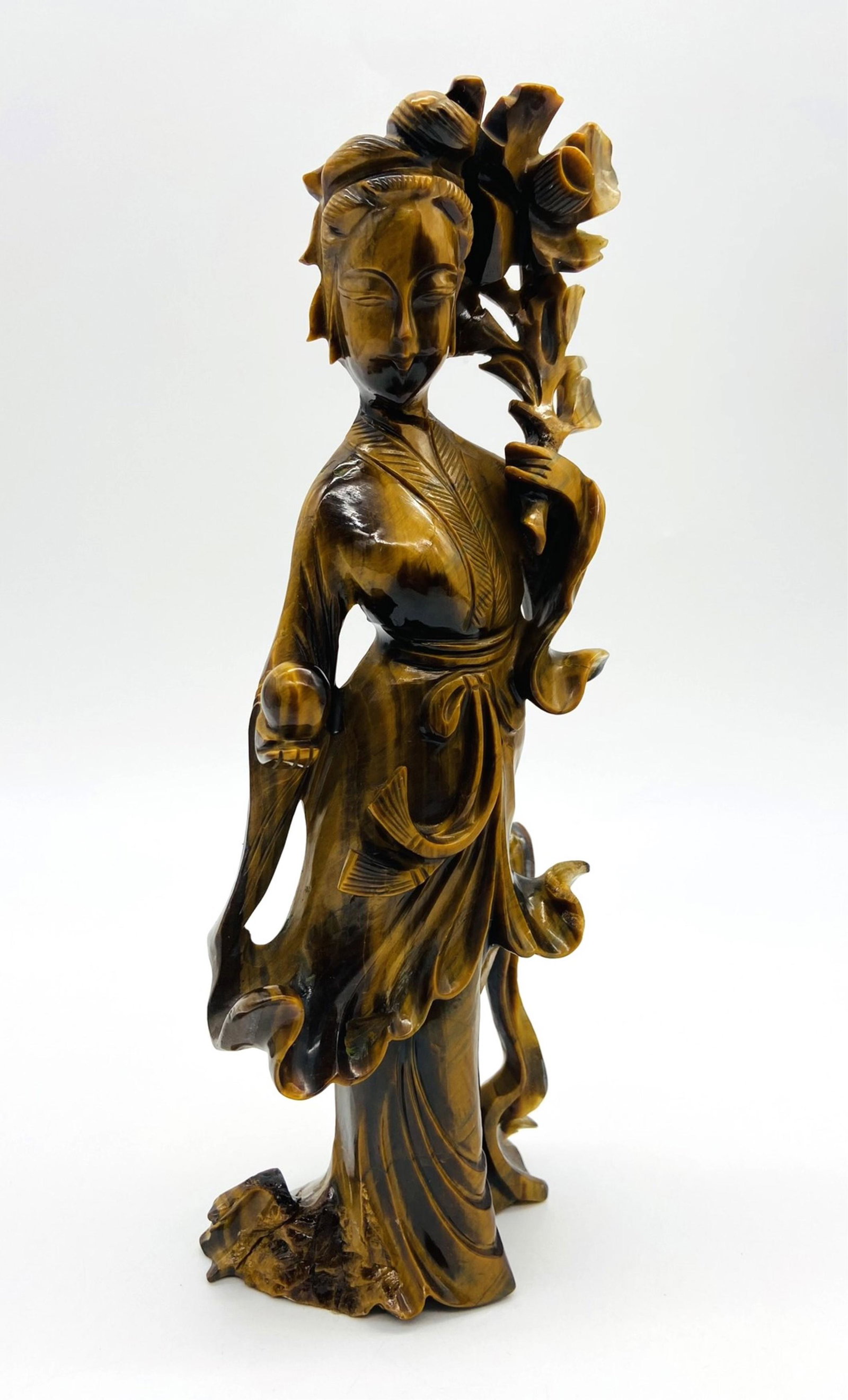 Fine Chinese Carved Tiger Eye Guanyin Figure: Fine Chinese Carved Tiger Eye Guanyin Figure. Republic period. Unsigned. Measures 9" H x 3" W x 1 7/8" D. In Fair Condition Multiple Breaks And Repairs. All Items Are Third party shipping or free loca