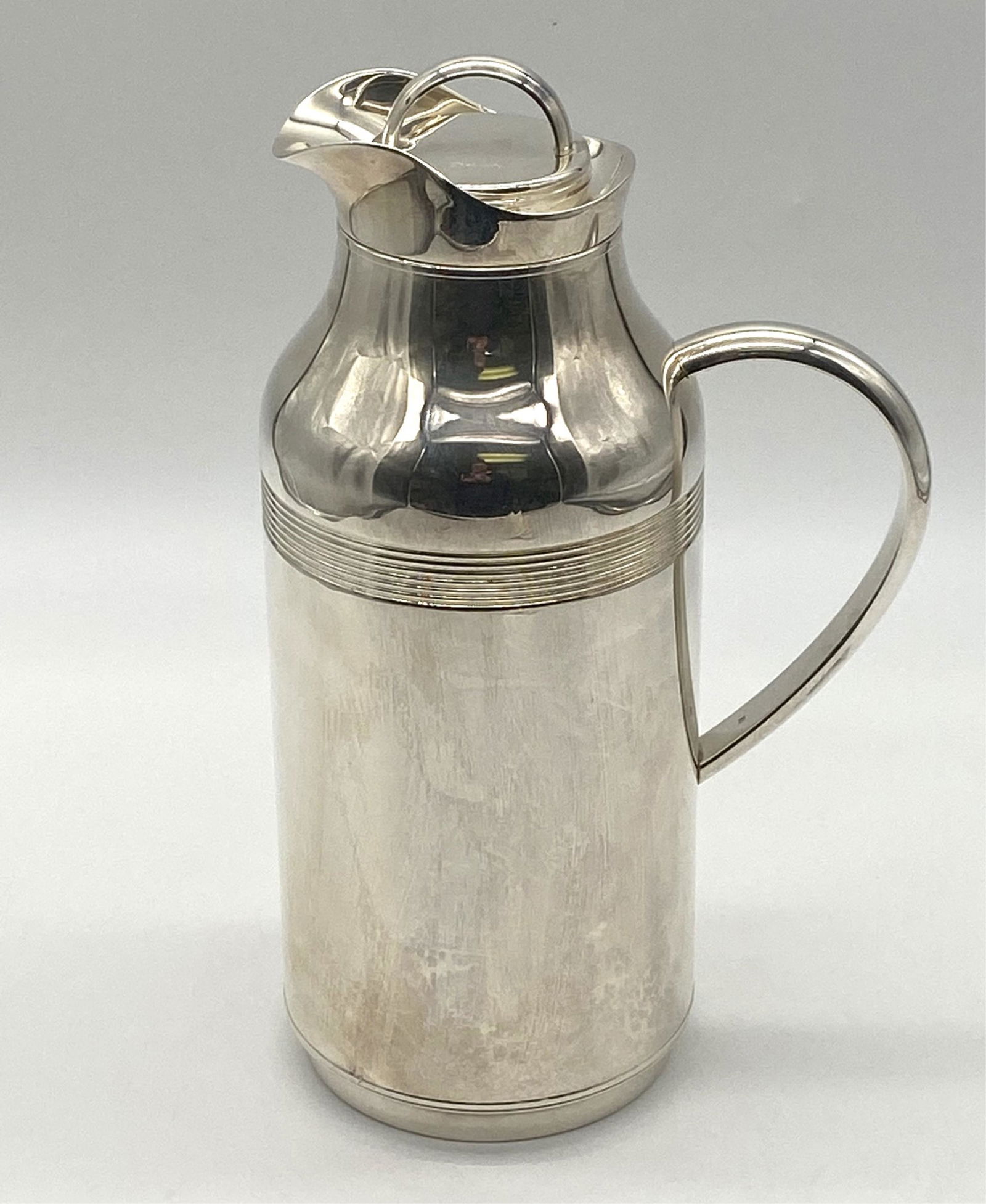 Vintage Christofle Silver Plate Thermos: Vintage Christofle Silver Plate Thermos. Marked Christofle on lid and handle. Measures 11" H x 6" D. In good condition light scuffs and scratches due to use. All Items Are Third party shipping or free