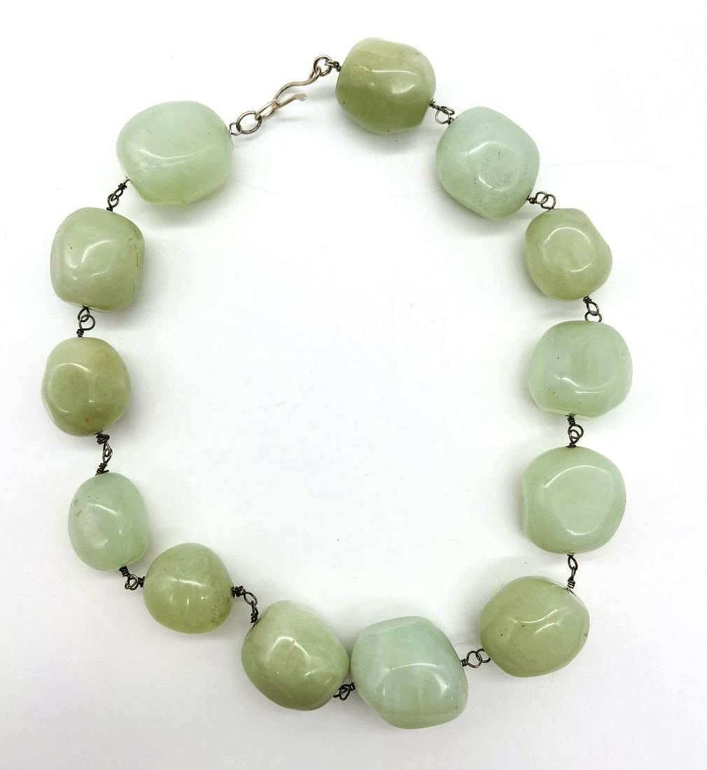 Chunky Jade Beaded Large Stone Choker: Chunky Jade Beaded Large Stone Choker. Natural stone impressions visible. Measures 16" L, 7" hanging. In great condition, no flaws. All Items Are Third party shipping or free local pick-up within 60 d