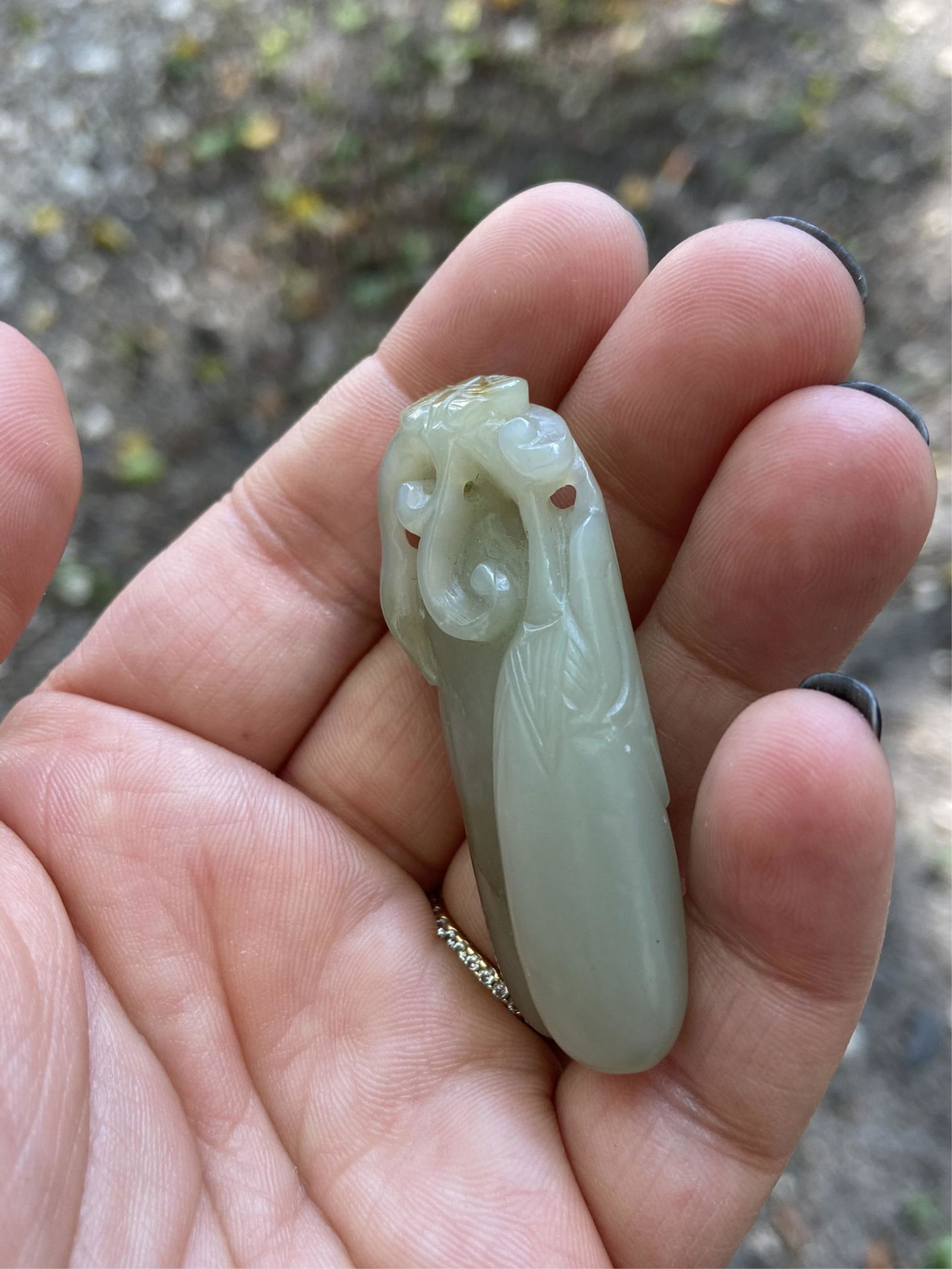 Chinese Celadon Jade Eggplant Carving: Chinese Celadon Jade Eggplant Carving. The celadon jade with natural veining and russet specks. Unsigned. Measures 2 inches. All Items are third party shipping or free local pick-up within 60 days of