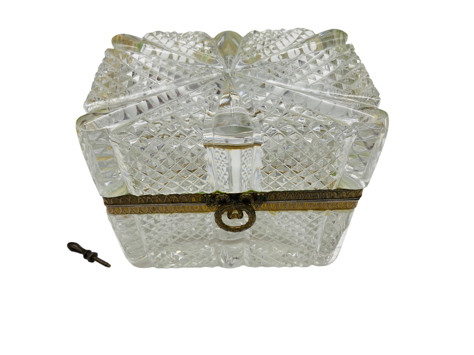 Antique Cut Crystal Casket Trinket Box: Antique Cut Crystal Casket Trinket Box. Unsigned. Measures 4.5" H x 5" L x 3 1/4" W. In great condition,no major loses to teeth, finile needs repair. All Items Are Third party shipping or free local p