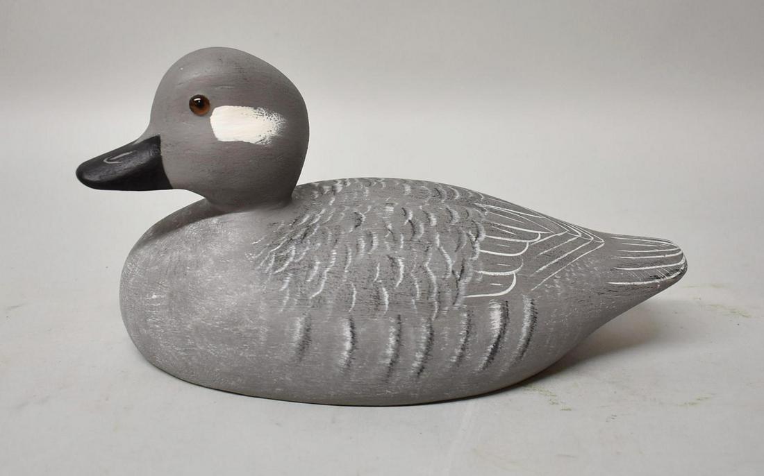 Bufflehead female decoy signed by J Cerreta: Bufflehead female decoy signed by Jim Cerreta. Glass eye, hand painted feathers, great detailing, turned head, signed JB Cerreta Sept 7, 1985. Dimensions 11" long x 6" tall x 5" wide.