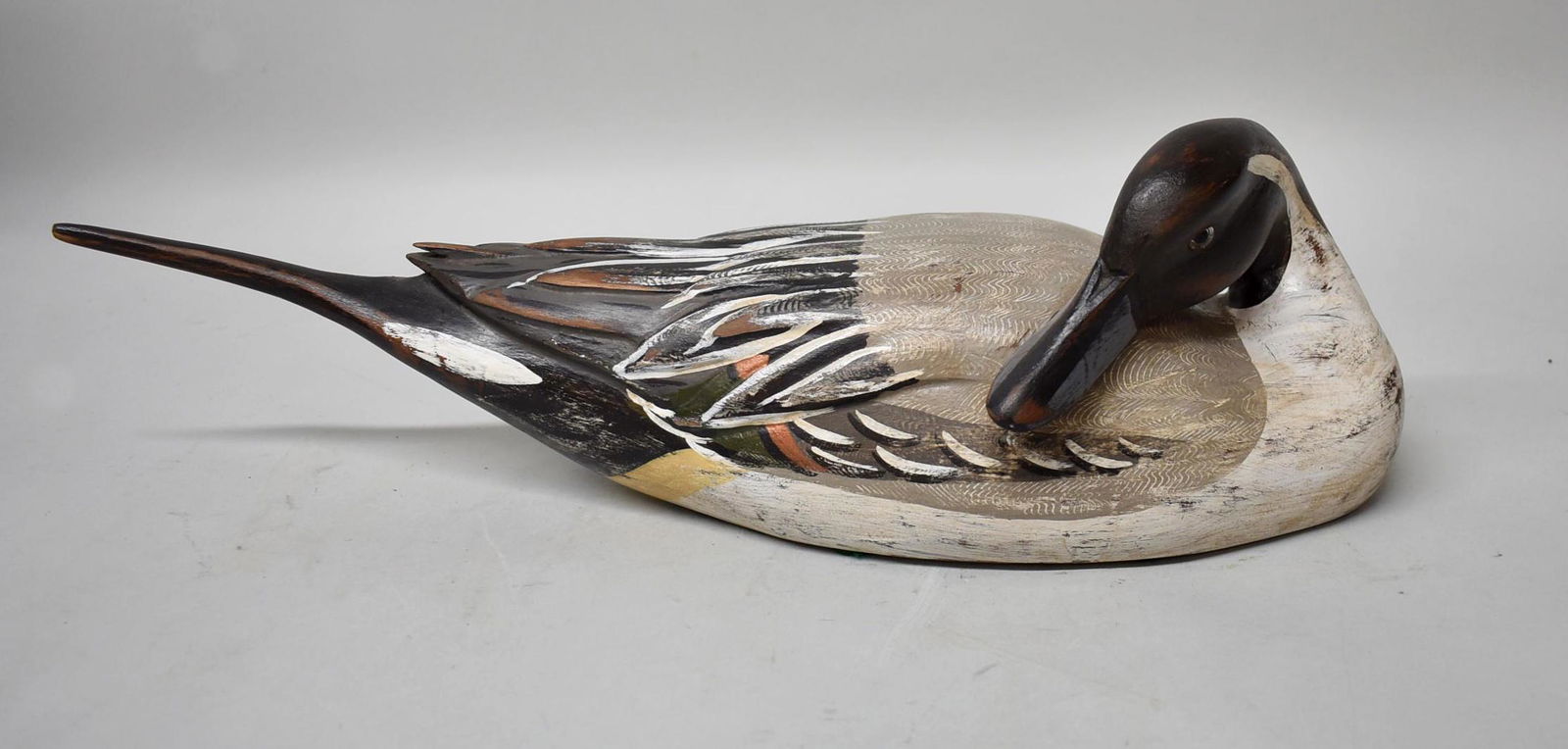Pintail Duck Decoy signed by Charles Moore: Pintail Duck Decoy signed by Charles Moore '87. Beautiful feather coming paint technique, grey glass eyes, minor paint loss.