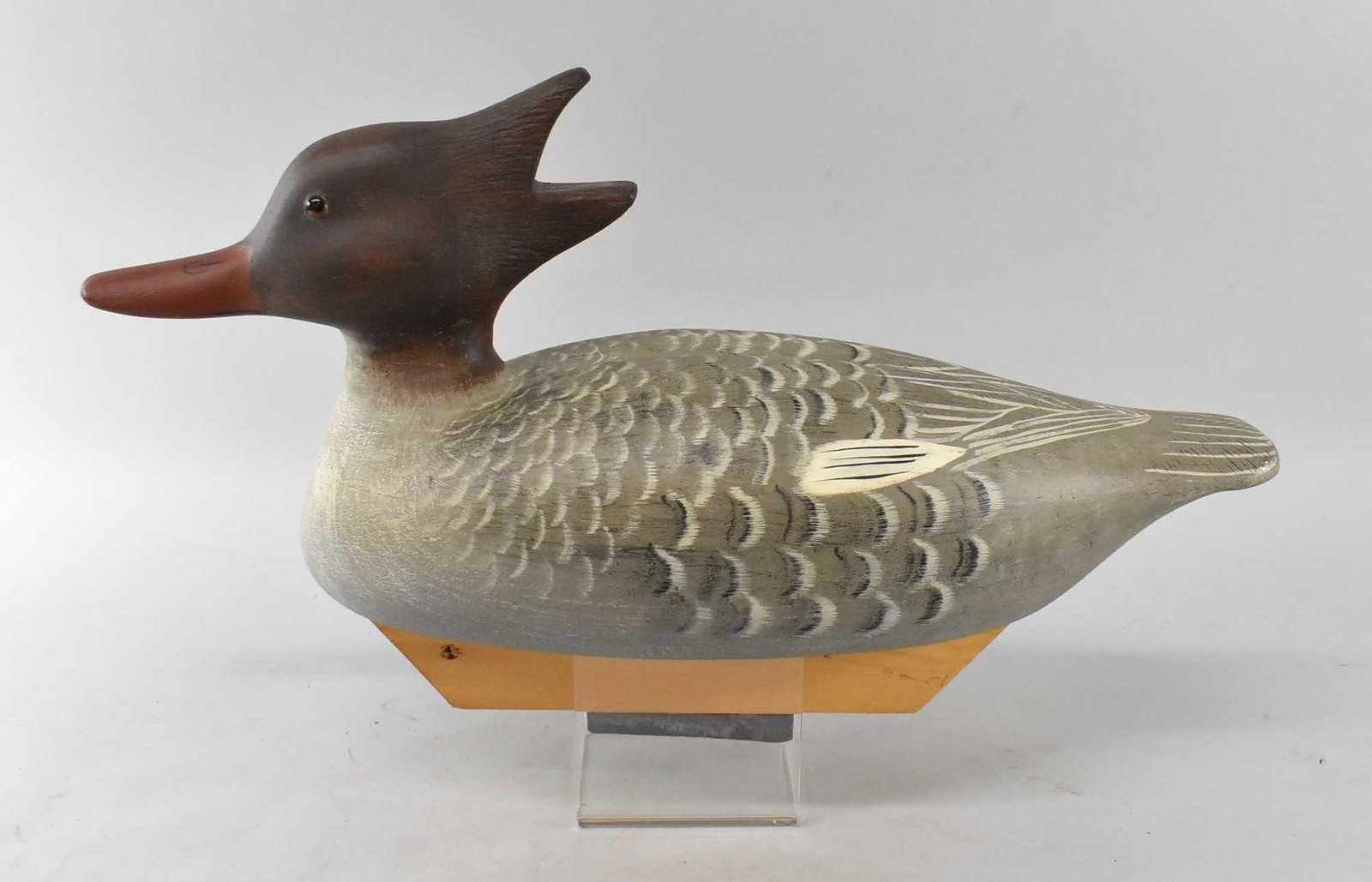 Red-Breasted Merganser Hen JB Cerreta: Red-Breasted Merganser Hen Decoy by JB Cerreta, signed. This beautifully painted decoy has a red glass eye and a wooden keel with weights. Signed JB Cerreta Feb 24, 1985. Dimensions 15 3/4" long x 7 1