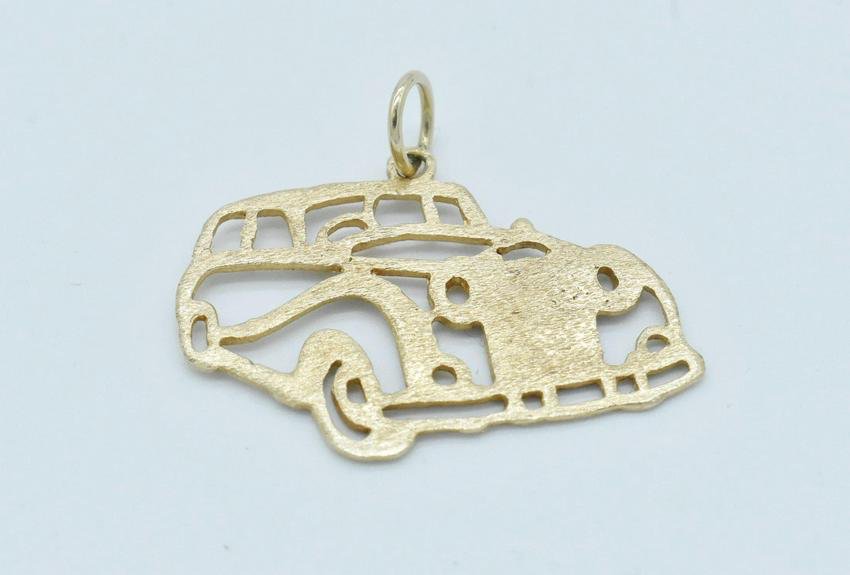 14k Rolls Royce Cut Out Pendant: 14K Rolls Royce cut out pendant/charm, tested 14K, 1 1/8" x 7/8". 2.2 grams