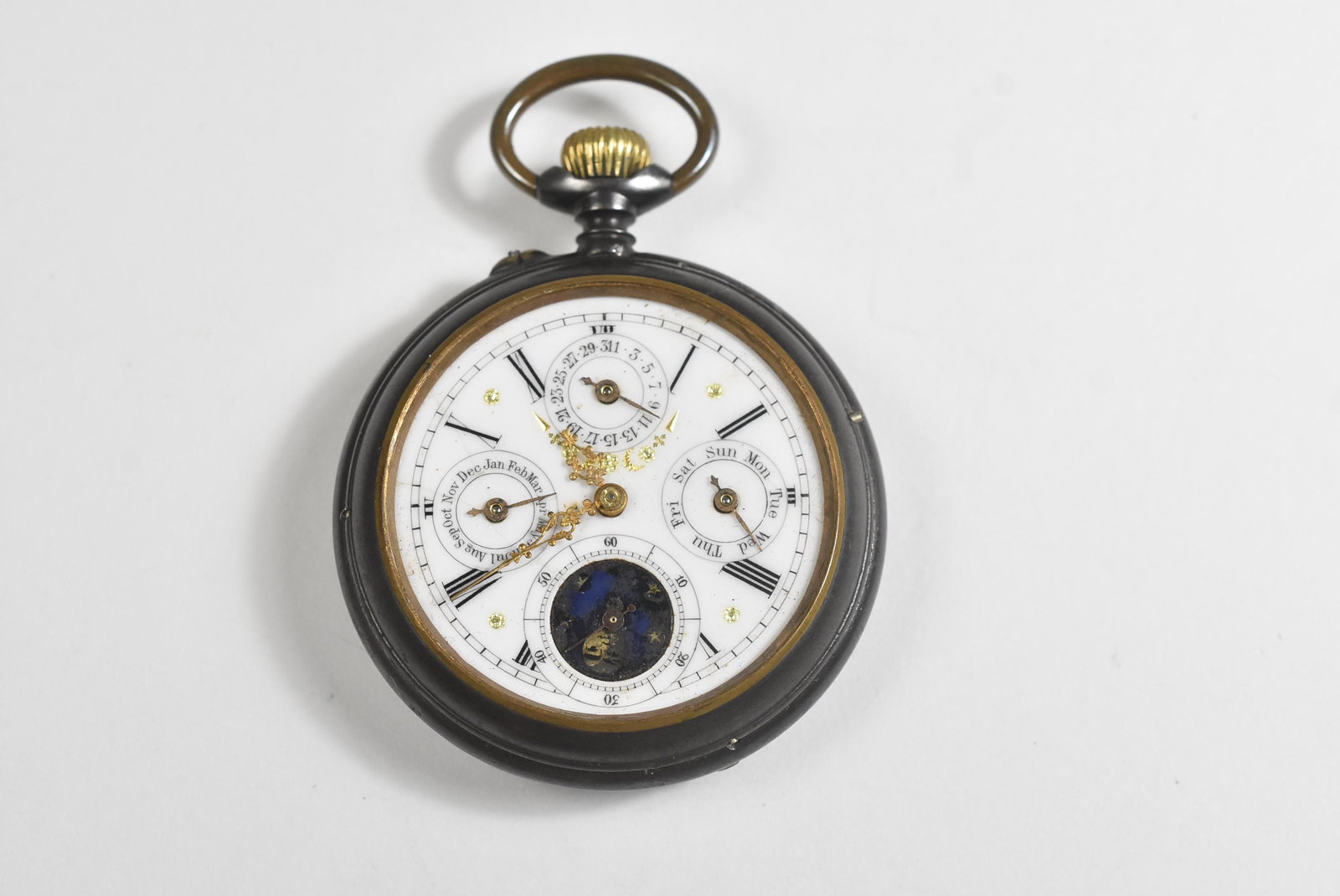 Swiss Calendar Moon Phase Pocket Watch: Swiss Calendar Moon Phase pocket watch, gun metal case, day, date, month with moon phase, nice dial no hairlines, missing the crystal, no dents, very good running condition.