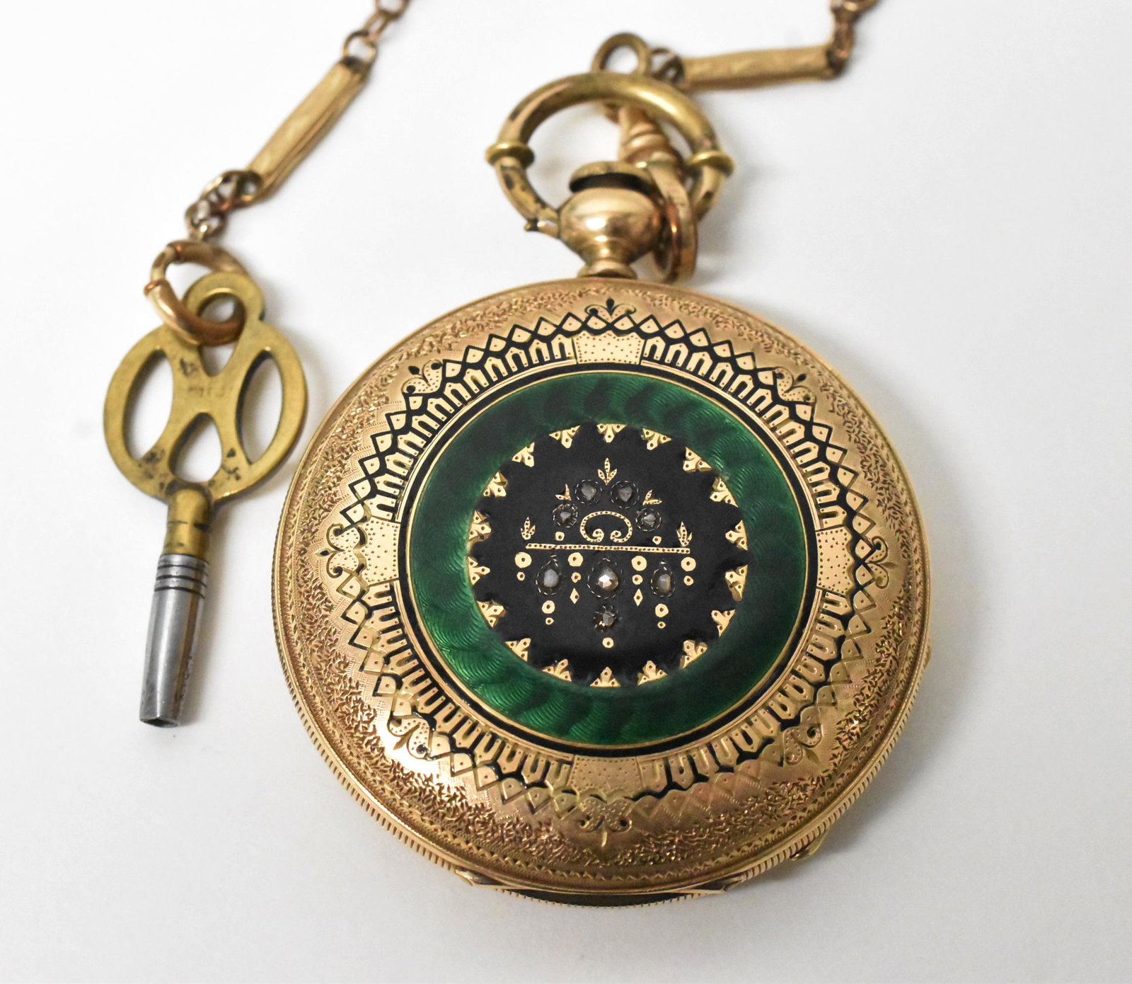 Early Swiss KW 14K HC Enameled 43mm: Pocket Watch Early Swiss KW 14K HC enameled, tested 14K, serial number 18345, J. Richard, Black and green enamel work with rose cut diamonds, KW movement, some scratches to the enamel, running conditi