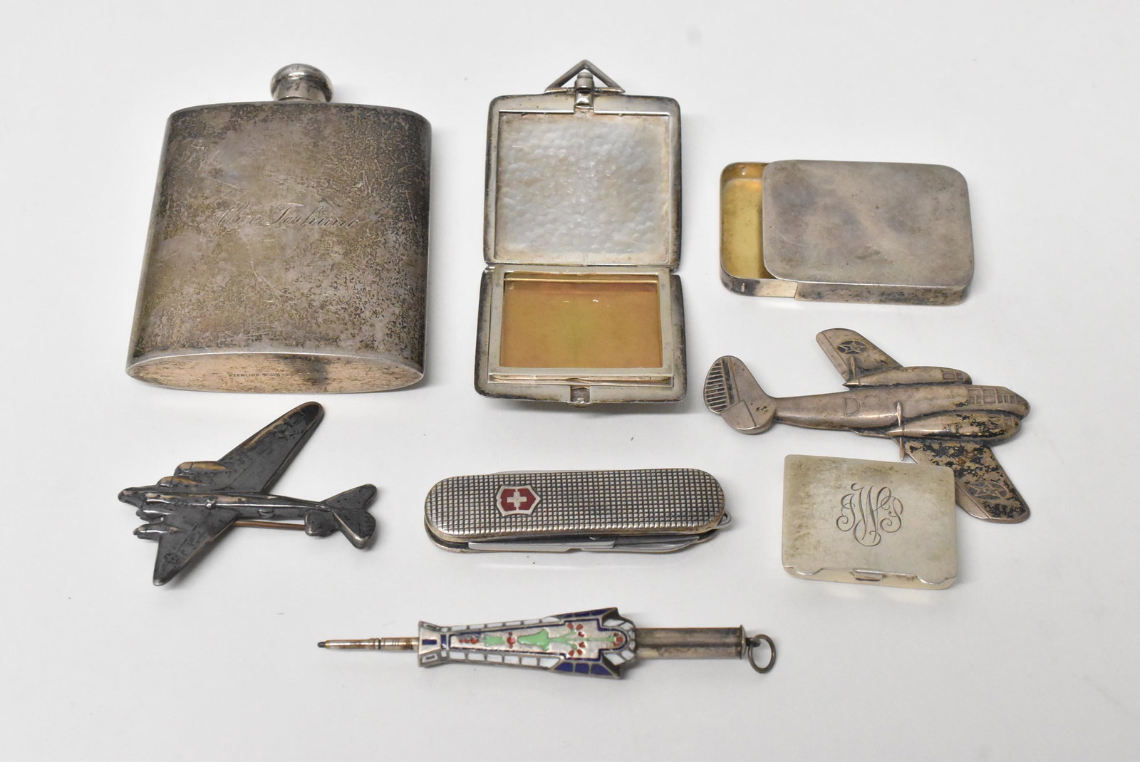 Group Sterling Objects B-52 Army: Group of sterling objects, flash, locket, Swiss Army Knife, 2 WWII Bomber Airplane Pins, B-52 Army, 2 pill cases. 197g TW