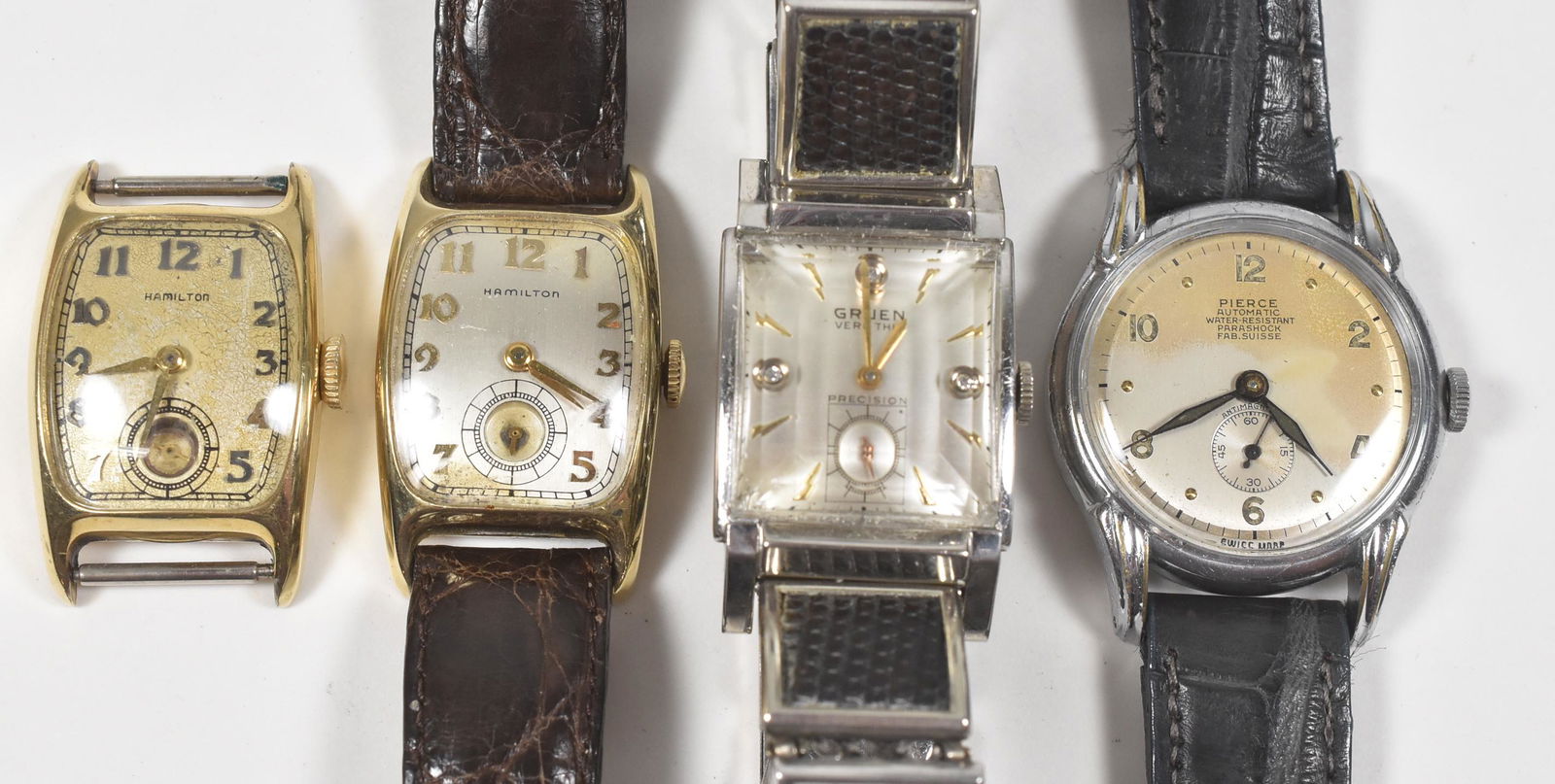Hamilton, Gruen, Pierce Group: Hamilton, Gruen, Pierce grouping. Gruen diamond dial gold filled, beveled crystal, running when catalogued. Hamilton 14 gold filled, inscription on back, 35mm, running when catalogued. Hamilton 14 gol
