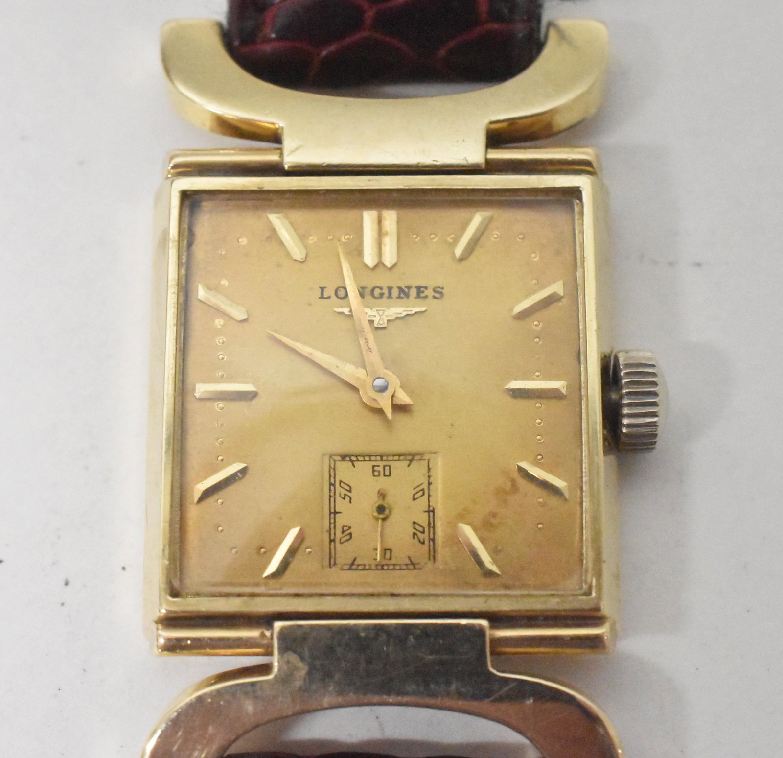 Longines Men's 14K Hinged Lugs: Longines Men's 14K, 22L, 17J nice case with hinged lugs, running condition when catalogued. 27 grams