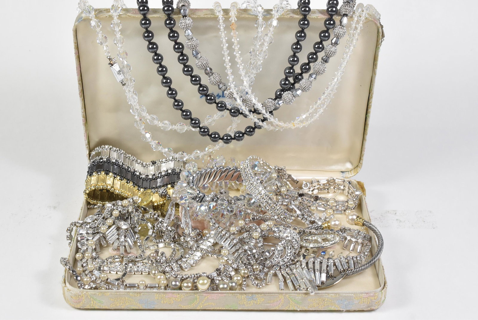 Rhinestone and Crystal Jewelry, Wedding Perfect: Rhinestone and crystal jewelry, perfect for a wedding. Necklaces, bracelets, screw back earrings, brooches, jewelry box by Bogoff, hematite beaded necklace, and loose pearls.