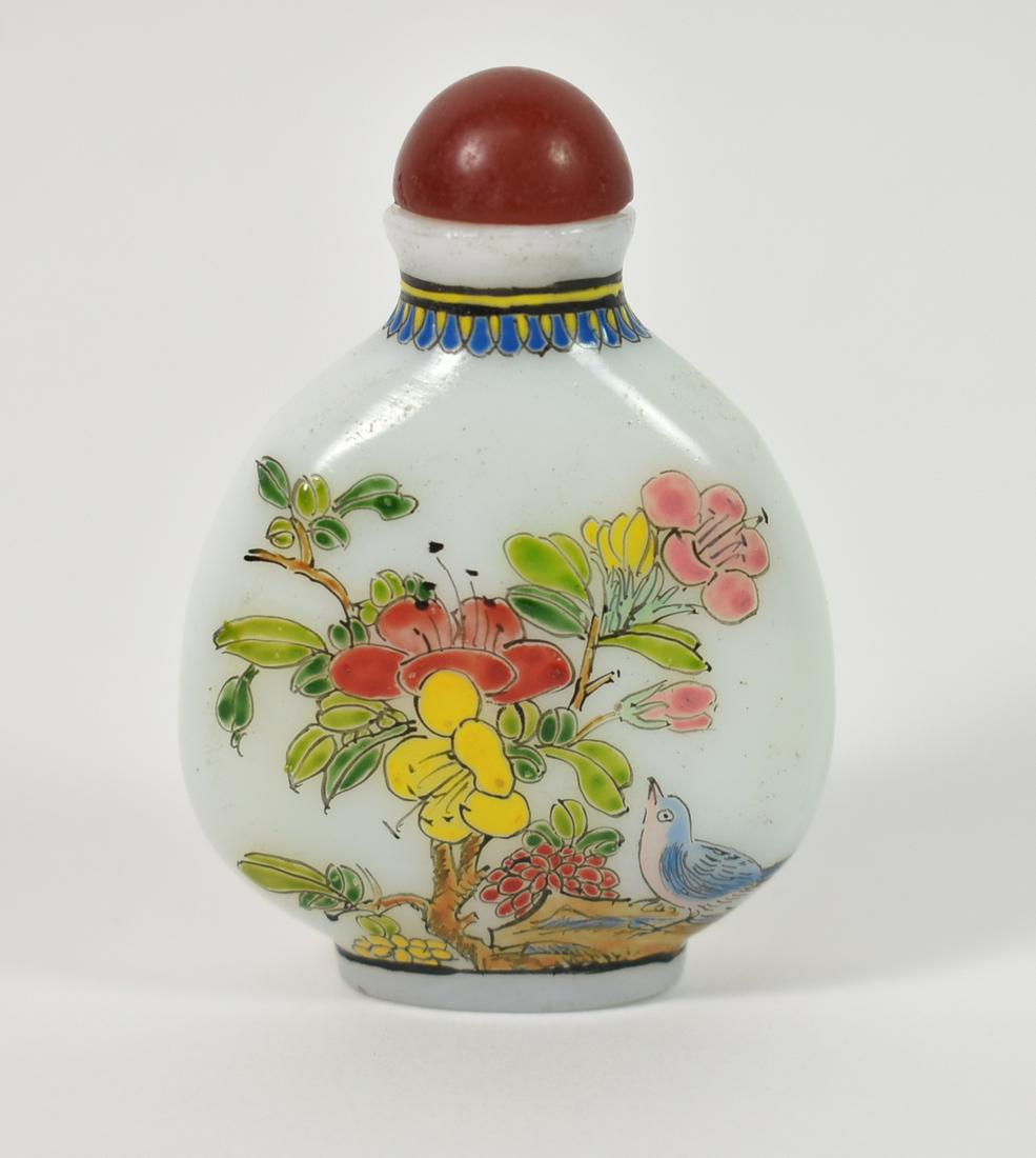 Chinese Snuff Bottle: Chinese snuff bottle handpainted with bluebirds, bamboo, hibiscus, and grapes. 2 3/4" tall x 2" wide.