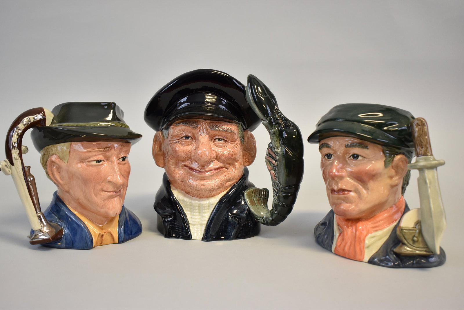 Royal Doulton Lobster Man D6617, The Antique Dealer D6807, Little Mester D6819: 3 piece set of Lobster Man D6617, The Antique Dealer D6807, Little Mester Museum Piece D6819,tallest one is 6 1/2"