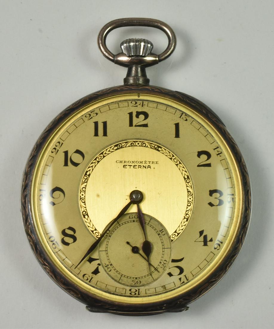 Eterna OF Silver Case Chronometer: Eterna OF Silver Case Chronometer. 46mm case. Marked 875 Silver. Stamped Argent and Eterna. Engraved flowers. Jeweled Movement. Not running, broken spring. Gold tone dial. 67.7 grams