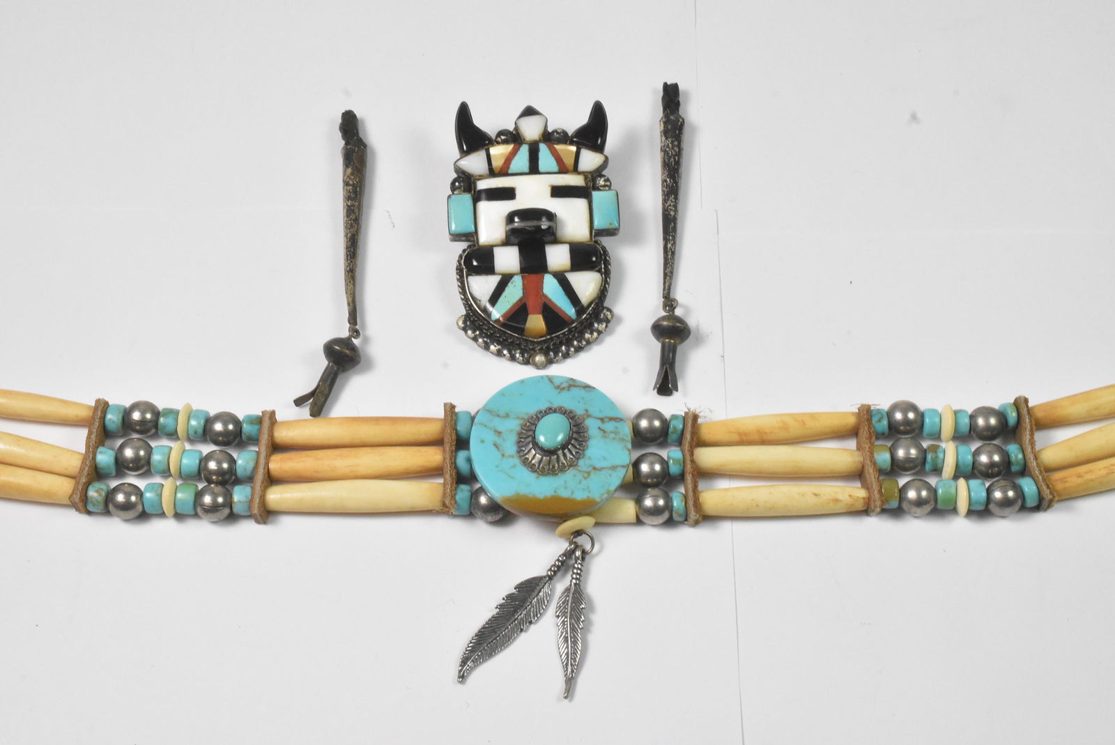 Native American Necklace and Bolo: Native American Necklace and Bolo. Bolo is Bull, turquoise, mother of pearl, coral, onyx and wood. Chocker is wood, turquoise and silver with leather tie. Choker section is 11 1/2" long with 1" wide a