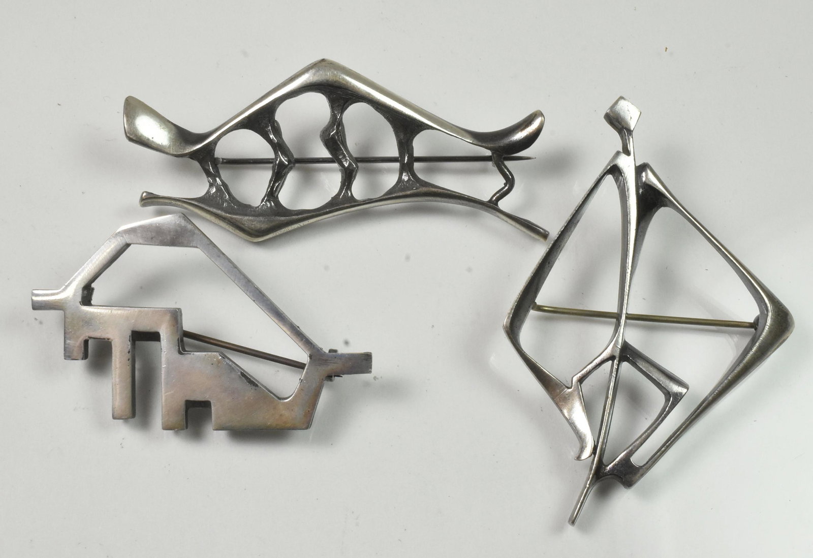 Sterling Modernist Danish Pins by J Tostrup: Sterling Modernist Danish Pins by J. Tostrup Group. Bull 2" long. Abstract Human. Gudmund Elvestad Designer. 42.6 grams