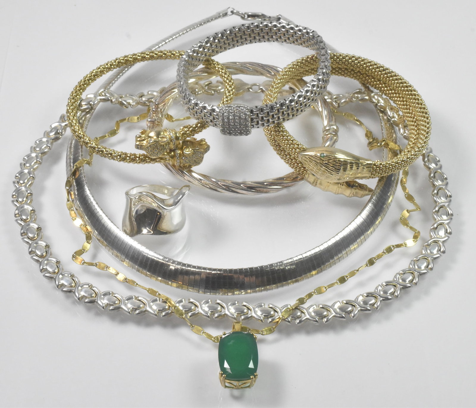 Italian Sterling Jewelry Group: Italian sterling group of assorted jewelry all marked. Four bracelets one coil panther design, one ring size 9, three necklaces 16 1/2" - 18, 164 grams in weight