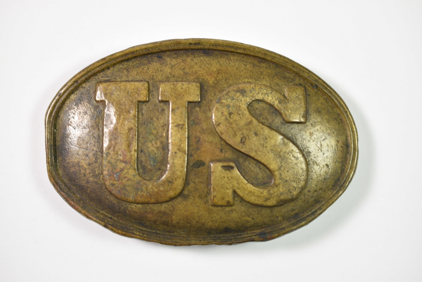 Civil War Brass Buckle: Civil War brass buckle, 3" brass buckle that is lead filled with a dent on one side.