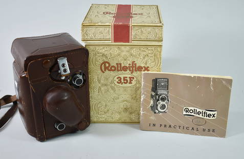 Rolleiflex 35mm Camera: Dual lens 35mm camera with box, 1.35/75 and 2.8/75, very good condition, marked DBP, not tested. 1 leather strap is broken.